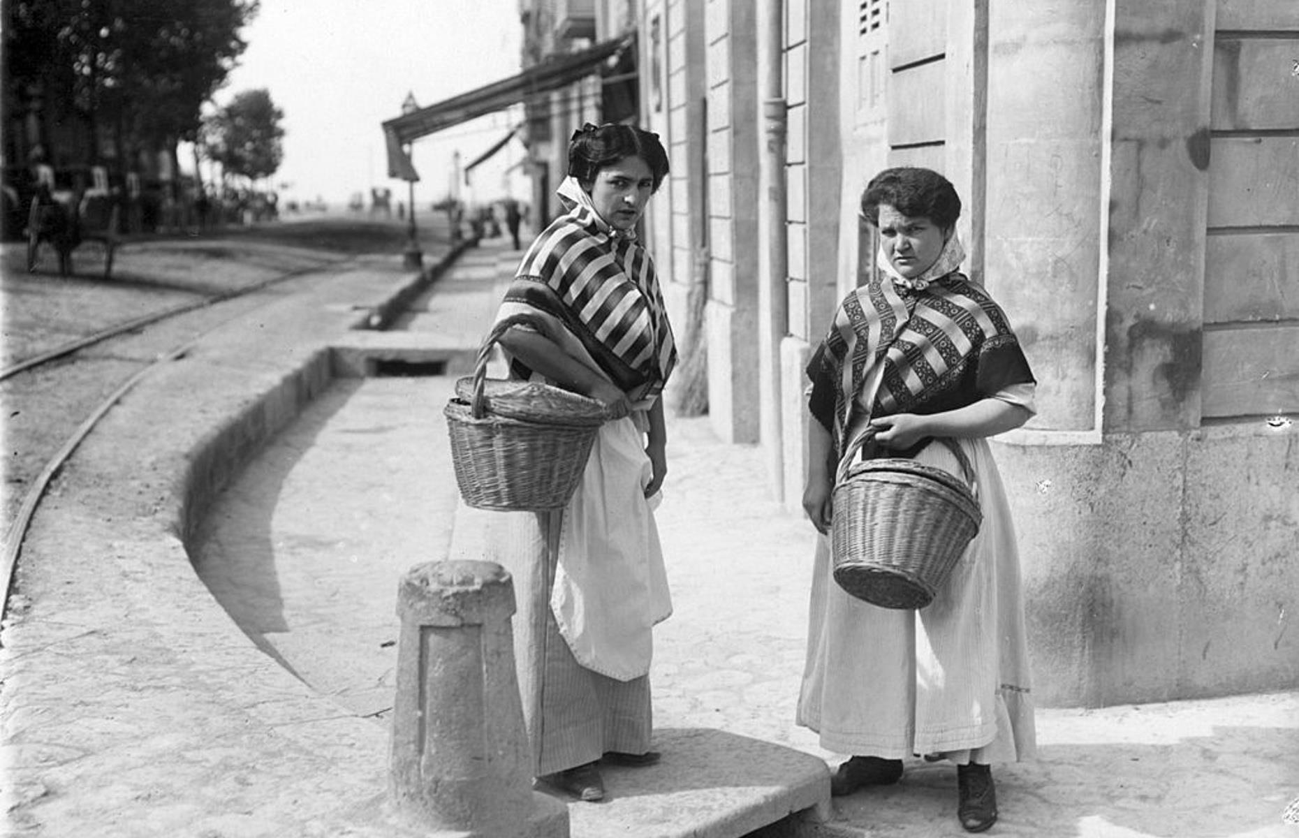 <p>Before the luxury hotels, swimming pools, fancy restaurants and beach umbrellas, Mallorca's unique culture was free to flourish – this 1930s photo shows women dressed in traditional costume with striped shawls and ‘rebozillo’ headdresses.</p>  <p><a href="https://www.loveexploring.com/news/71845/things-to-do-in-palma-mallorca"><strong>A Balearic stunner: what to see and do in Palma, Mallorca</strong></a></p>