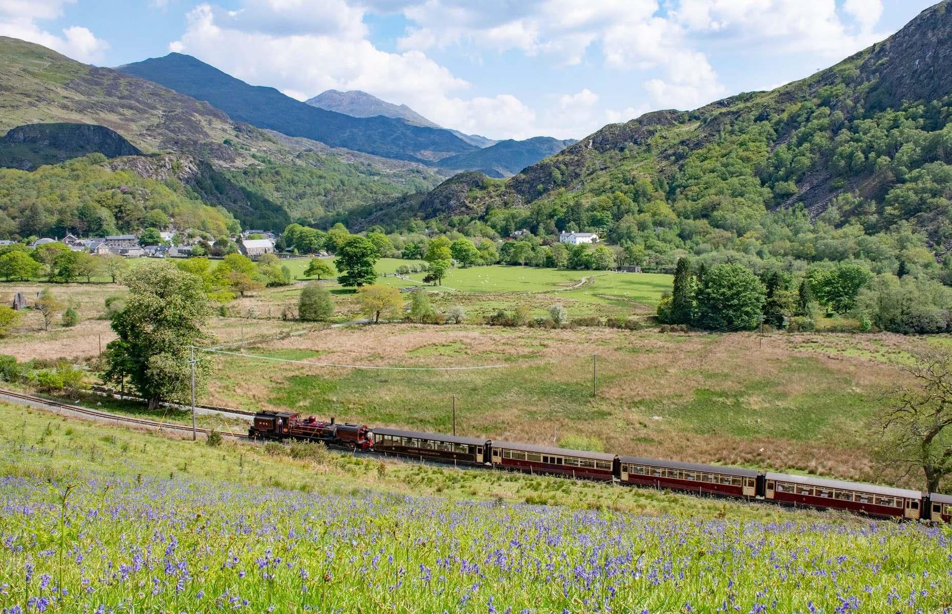 <p>The oldest independent railway company in the world, the <a href="https://www.festrail.co.uk/">Ffestiniog Railway</a> has been slicing through the Snowdonia National Park since 1832. The historic train takes passengers 13.5 miles (21.7km) from the harbour in Porthmadog to the slate quarrying town of Blaenau Ffestiniog, winding around the rocky mountains. Highlights from the journey include passing along mountain scenery, tranquil pastures and picture-perfect villages.</p>  <p><a href="http://www.loveexploring.com/galleries/97614/incredible-images-that-capture-the-history-of-train-travel?page=1"><strong>Check out these incredible images that capture the history of train travel</strong></a></p>