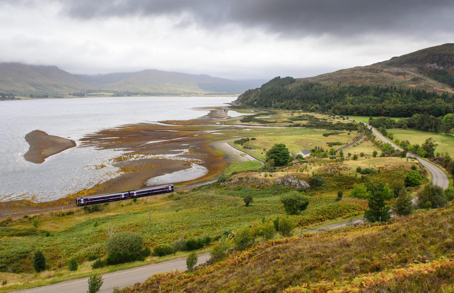 <p>Whether it’s starting from Inverness or Kyle of Lochalsh, this <a href="http://www.kylerailway.co.uk/">coast to coast rail journey</a> through the Scottish Highlands is a truly unforgettable experience. Spanning 80 miles (129km) from Scotland’s east coast to the west, the Kyle Line travels from jagged peaks and dense forests to picturesque hillsides and glittering lochs. The spectacular journey takes around two hours and 40 minutes featuring gorgeous views of Skye, stunning Highland scenery and the pretty shores of Loch Alsh. </p>  <p><a href="https://www.loveexploring.com/gallerylist/111452/the-uks-most-beautiful-views-ranked"><strong>Discover the UK’s most beautiful views ranked</strong></a></p>