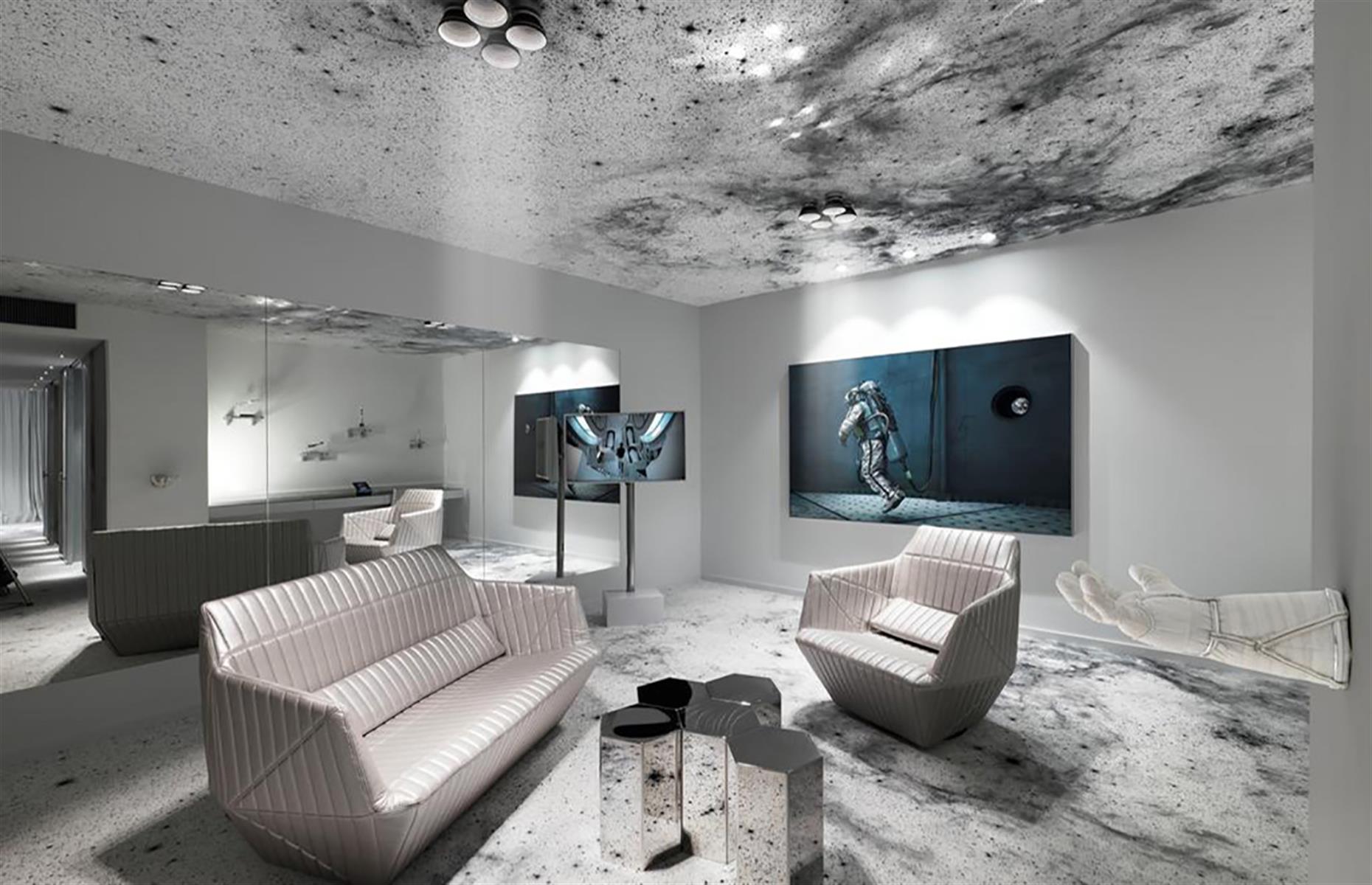 <p>One small step for a man, one giant leap for you to get to your bed in this spacious moon-themed executive suite at the <a href="http://www.booking.com/hotel/ch/kameha-grand-zurich-autograph-collection.en-gb.html" rel="nofollow” target=">Kameha Grand Zürich</a>. The floors and ceilings are made to look like the surface of the moon, while the furniture and dècor resembles that of a spaceship. It's all finished with paintings of astronauts and lamps that resemble the engines on a spaceship for you to step straight into what looks like a set for <em>Gravity</em> or <em>Interstellar</em>.</p>  <p><strong><a href="https://www.loveexploring.com/gallerylist/65474/awesome-filming-locations-you-can-visit">Take a look at stunning filming locations you can actually visit</a></strong></p>