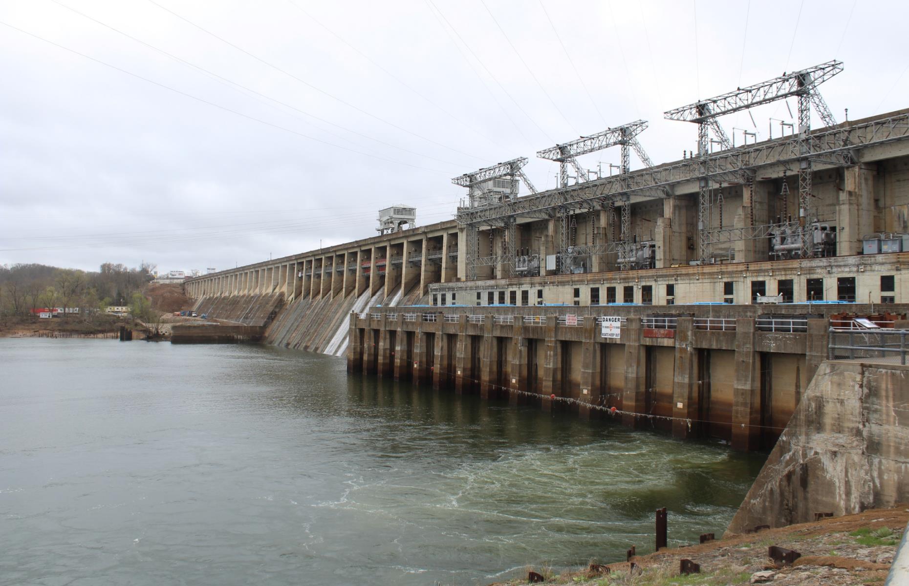 <p>Bagnell Dam, <a href="https://www.ameren.com/missouri/residential/lake-of-the-ozarks/bagnell-dam">the largest and last major dam</a> in the United States to be financed through private investment, is the reason the Lake of the Ozarks exists. The spectacular feat of engineering harnesses the Osage River and is a half-mile (0.8km) long, holding back 600 billion gallons of water. It’s a producer of energy, creating enough power to supply 42,000 households throughout the year.</p>