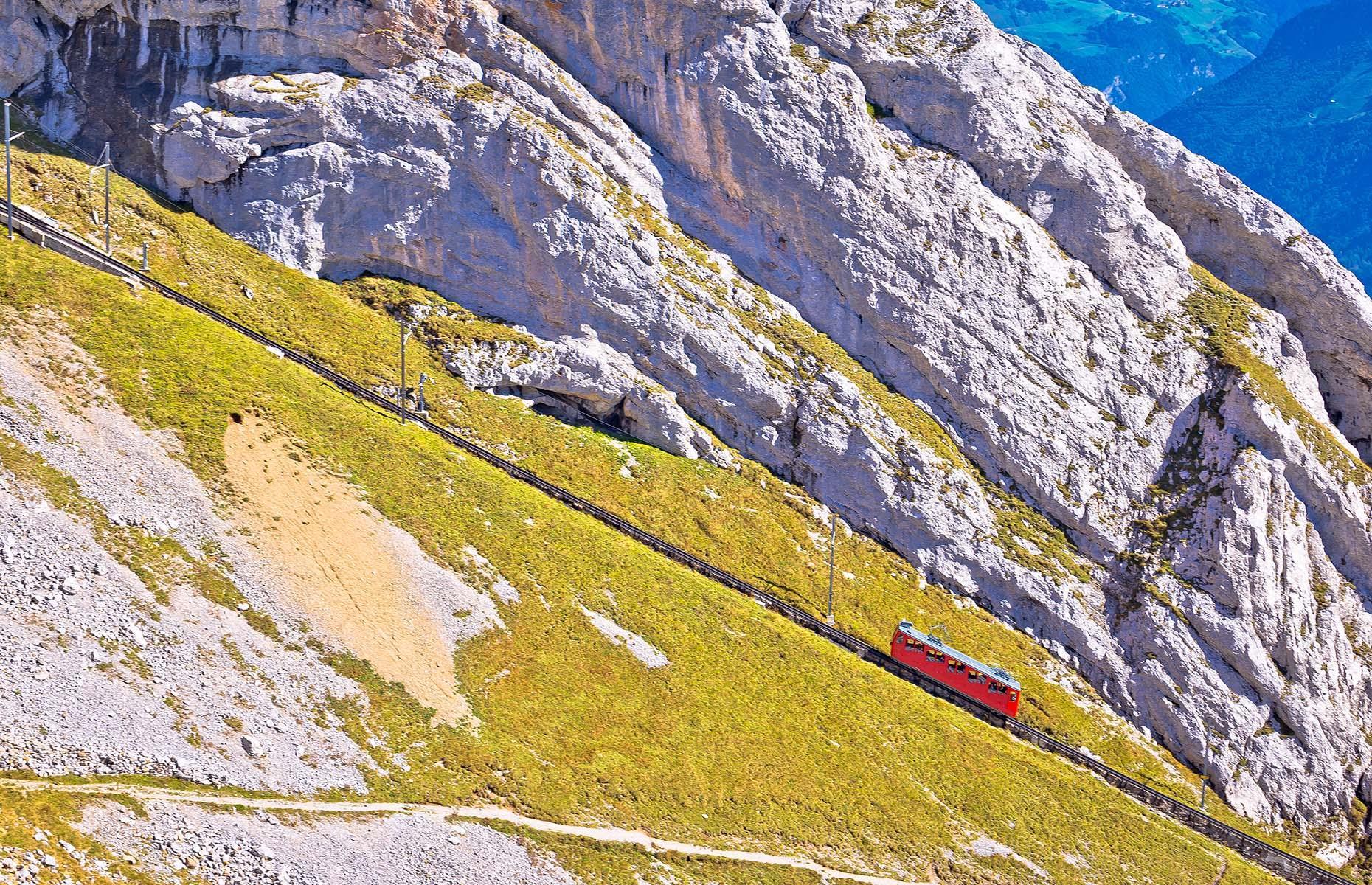 <p><a href="https://www.bbc.co.uk/news/world-europe-42384814">The steepest cogwheel railway in the world</a>, this train, ferrying passengers up to the summit of Mount Pilatus, is no mean feat. Reaching a maximum gradient of up to 48% it can be a challenging journey as it feels like the train is about to topple over at any second. The track's steep gradient is not its only spine-chilling feature. Clinging on to the mountainside, the train passes through tunnels carved into the mountain which open up to sweeping views of the surrounding landscape.</p>