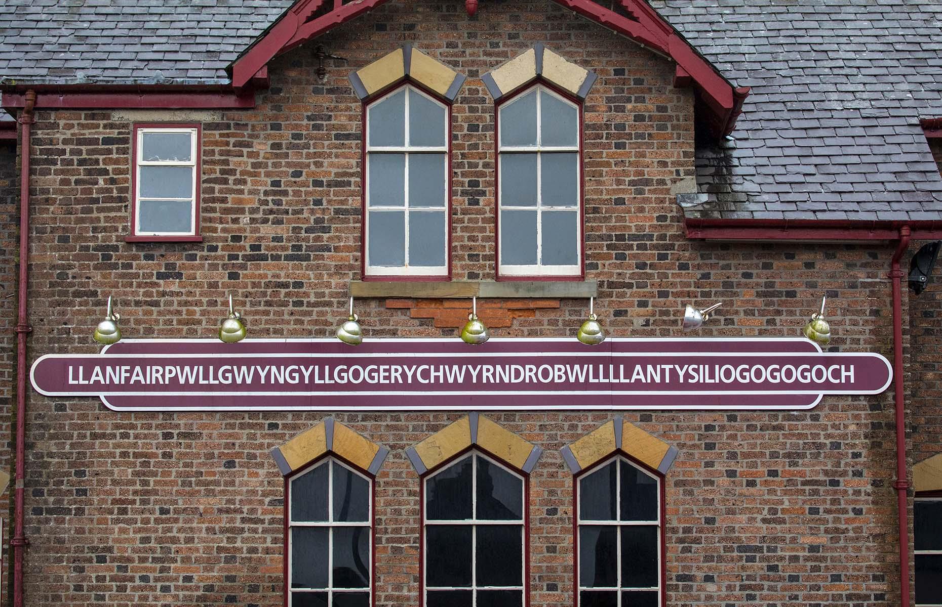 <p>Llanfairpwllgwyngyllgogerychwyrndrobwllllantysiliogogogoch – you'll find <a href="https://www.showmewales.co.uk/thedms.aspx?dms=3&venue=1162560">this remarkable train station</a> in Wales in the UK. Exactly 58 letters long, the station serves the village of Llanfairpwllgwyngyll and roughly translates as St Mary's Church in the hollow of white hazel near a rapid whirlpool and the Church of St Tysilio near the red cave in English. As it turns out, the name has no historic significance and is a marketing gimmick from the 1880s to attract tourists that stuck.</p>