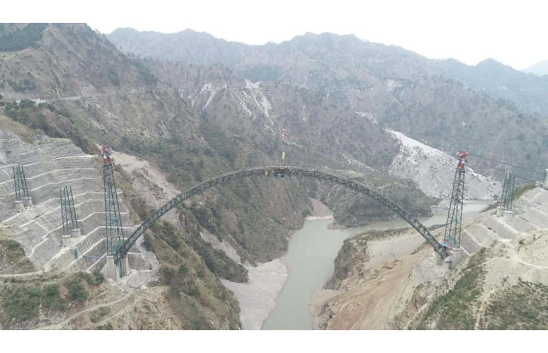 <p>In construction since 2004, this remarkable bridge across the Chenab river in India is <a href="https://economictimes.indiatimes.com/industry/transportation/railways/india-completes-arch-of-worlds-highest-railway-bridge-on-chenab-in-jammu-and-kashmir/safety-first/slideshow/81946509.cms">set to soon become the world's highest</a>. Suspended 1,178 feet (359m) above the river – that's 98 feet (30m) higher than the Eiffel Tower – the railway line crossing the bridge will connect Kashmir and Kanyakumari. The full length of the bridge is <a href="https://www.newcivilengineer.com/latest/worlds-highest-rail-bridge-takes-shape-30-04-2021/">1,532 feet (1,315m)</a> and is surely going to make for a spine-tingling ride.</p>  <p><a href="https://www.loveexploring.com/galleries/104228/breathtaking-bridges-you-can-walk-across?page=1"><strong>You can walk across these breathtaking bridges</strong></a></p>