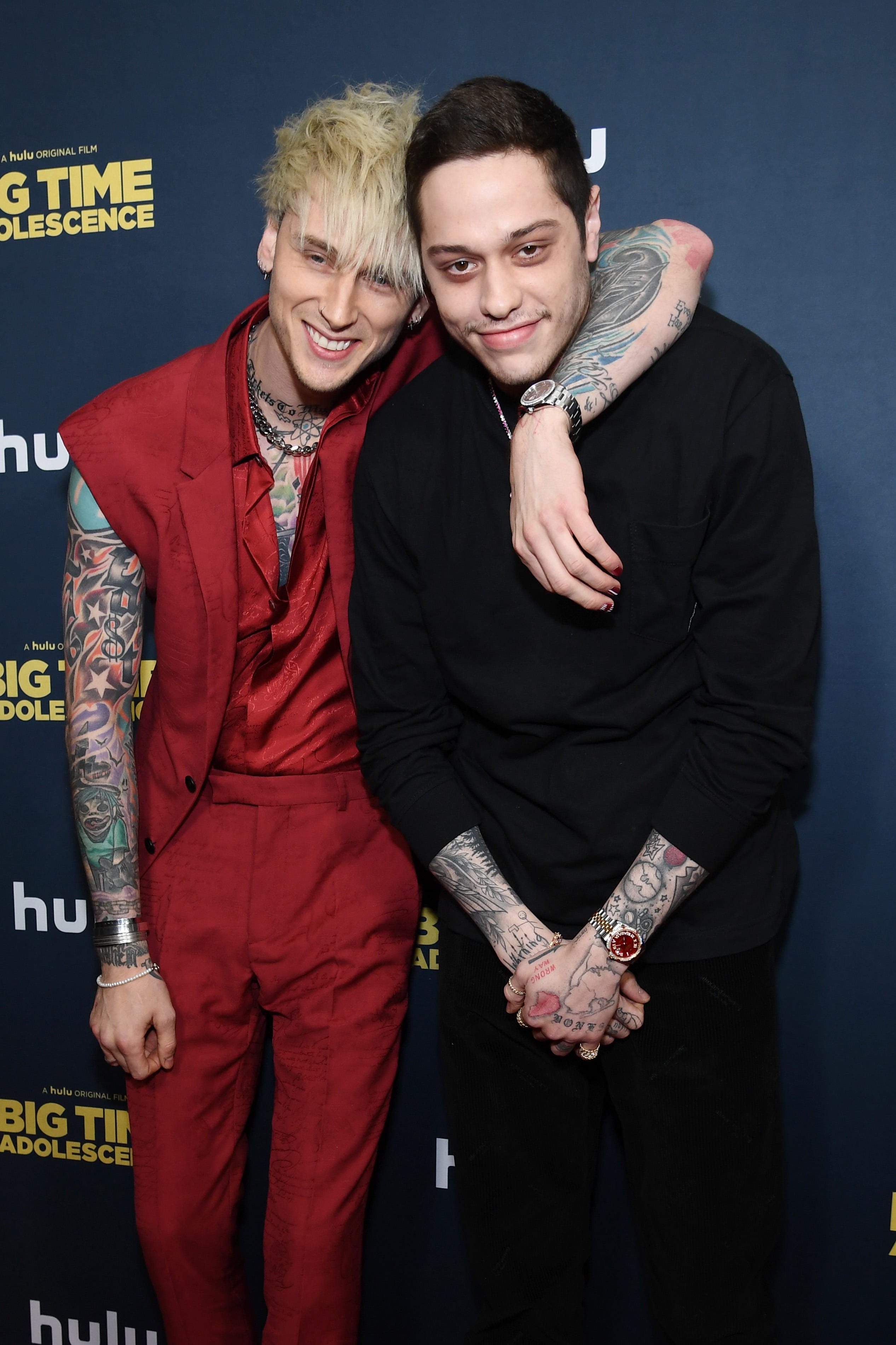 Slide 4 of 11: Davidson posed with Machine Gun Kelly at the premiere of "Big Time Adolescence" at Metrograph in March 2020.