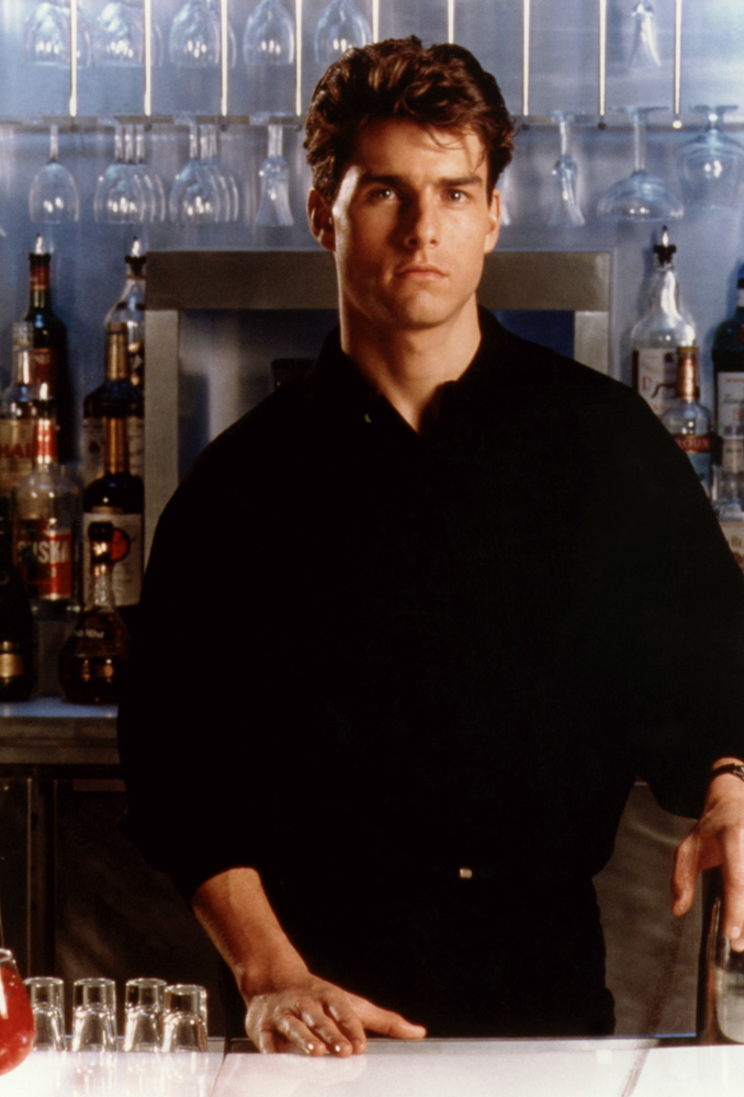 <p>Tom Cruise is seen here in 1988’s ‘Cocktail’. He played Brian Flanagan, a bartender who wants a high-paying marketing job in the rom-com, which was directed by Roger Donaldson of ‘Dante’s Peak’ fame. The movie was panned but was a commercial success, raking in $170 million worldwide off a $20 million budget. ‘Cocktail’ also starred Bryan Brown and Elisabeth Shue.</p>