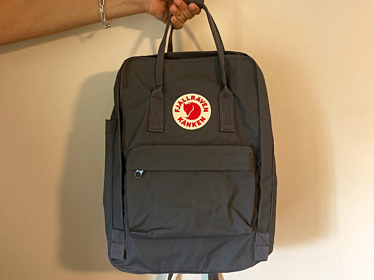<div class="bi-product-card"><div class="product-card-options"><div class="product-card-option"><div class="product-card-button"><a href="https://www.fjallraven.com/us/en-us/bags-gear/kanken/kanken-bags/kanken-laptop-15"><span>$120.00 FROM FJÄLLRÄVEN</span></a></div></div></div></div><p>I see this backpack all the time on my college campus, and here's why: The compact rectangular design can be expanded, making it especially versatile. The sleek look makes this a functional piece as well as a nice addition to almost any outfit. It has three pockets: a laptop pocket, main compartment, and outer pouch. The laptop pocket is well padded and the zipper is tucked away in the back. The straps are nice and soft, though oriented differently than the typical backpack, and it has two side pouches that can be used to store a water bottle and possibly even an umbrella.</p>