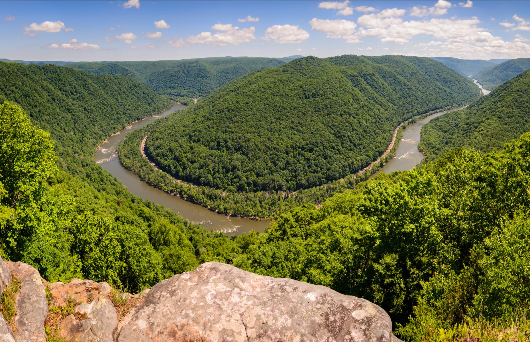 <p><a href="https://www.nps.gov/neri/index.htm">New River Gorge</a> was designated a national park in late 2020 and it has long been a favorite spot thanks to those incredible views over the bend in the New River, flanked by thickly forested hills. It’s also a popular whitewater rafting destination, with the river flowing in parts through canyons. Families can explore the glorious greenery on their own or take a ranger-led tour or nature walk.</p>  <p><strong><a href="https://www.loveexploring.com/galleries/118181/your-states-most-beautiful-natural-wonder">This is your state's most beautiful natural wonder</a></strong></p>