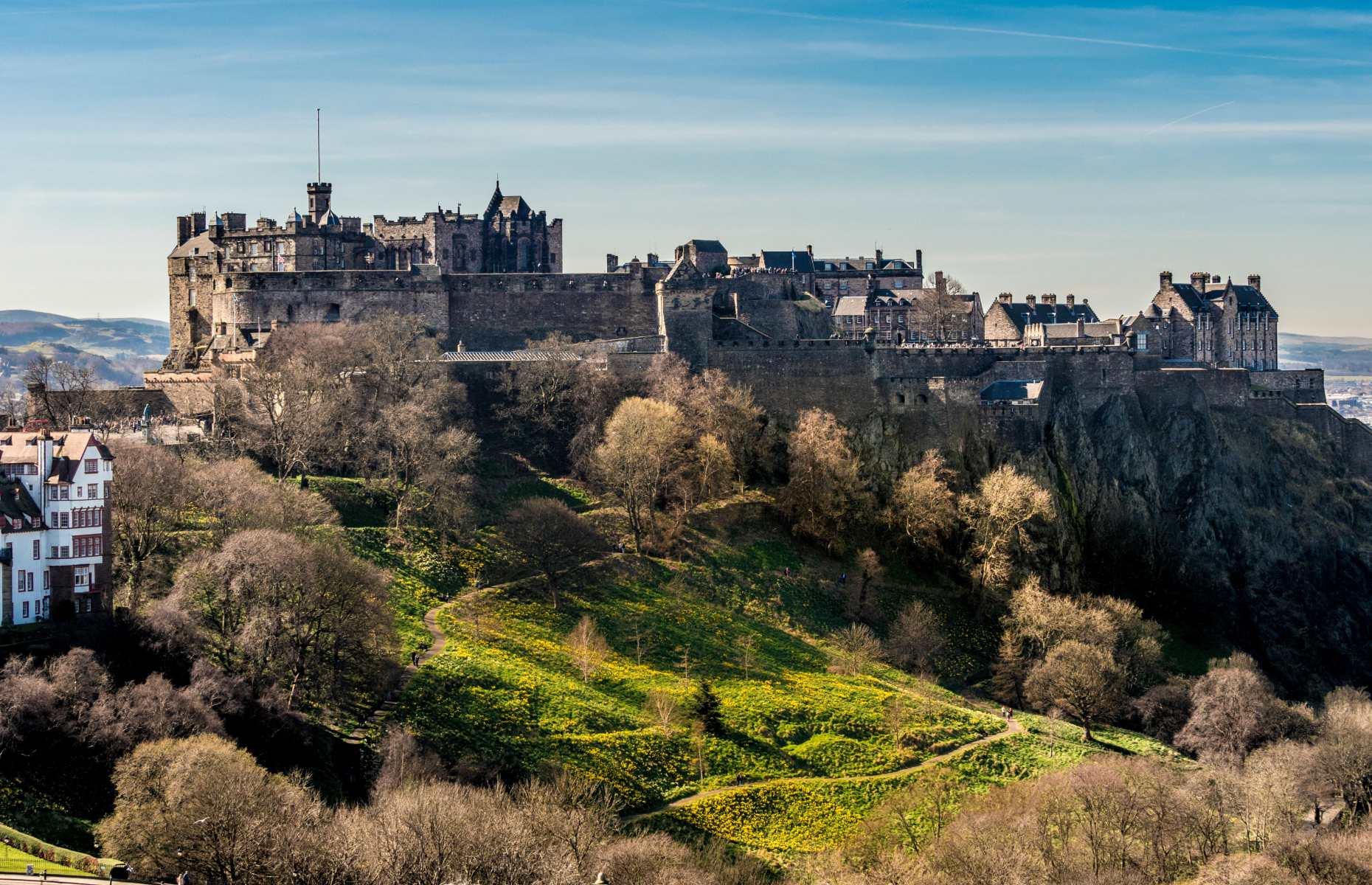 <p>Edinburgh Castle has watched over Scotland's <a href="https://www.loveexploring.com/guides/79636/explore-edinburgh-places-to-see-what-to-do-and-where-to-stay">capital city</a> from its lofty site on a rugged volcanic plug for centuries. Built during the 12th century by King David I, the son of Saint Margaret of Scotland, the fortress was the home of Scottish kings and queens until the union of the crowns in 1603. The castle’s St Margaret's Chapel was built by King David I in his mother’s honour and is the oldest building in Edinburgh. Soaring over the city’s urban sprawl on Castle Rock, the castle is one of the country’s most popular attractions.</p>  <p><strong><a href="https://www.loveexploring.com/gallerylist/67038/30-of-europes-most-beautiful-castles">Explore Europe’s most beautiful castles</a></strong></p>