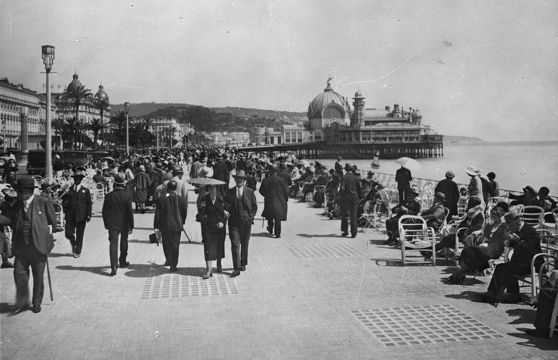 <p>Another French Riviera city, Nice, was equally en vogue, especially for aristocrats who preferred to escape the gloomy British winter and settle here until spring. Nice's popularity boomed even more following the refurbishment of the city's main seaside promenade, the Promenade des Anglais, in 1931. In this image, captured shortly after its opening, people are seen enjoying a casual stroll, with the stunning Casino de la Jetée in the background. Sadly, the casino was stripped of all its metals for the German war effort during the Second World War and destroyed.</p>