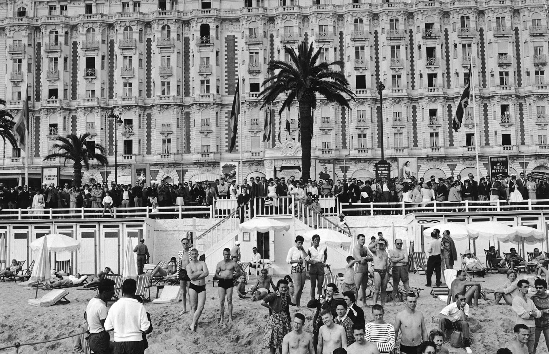 During the Second World War, many of the French Riviera's towns and cities were badly damaged, but peacetime saw artists like Marc Chagall and Pablo Picasso return to live here. Cannes really came to life in 1946, when the Cannes Film Festival was launched, marking the return of French cinema to world screens. Here, movie fans are captured in 1959 outside the Carlton Hotel, waiting for their favorite movie stars to arrive for the festival.