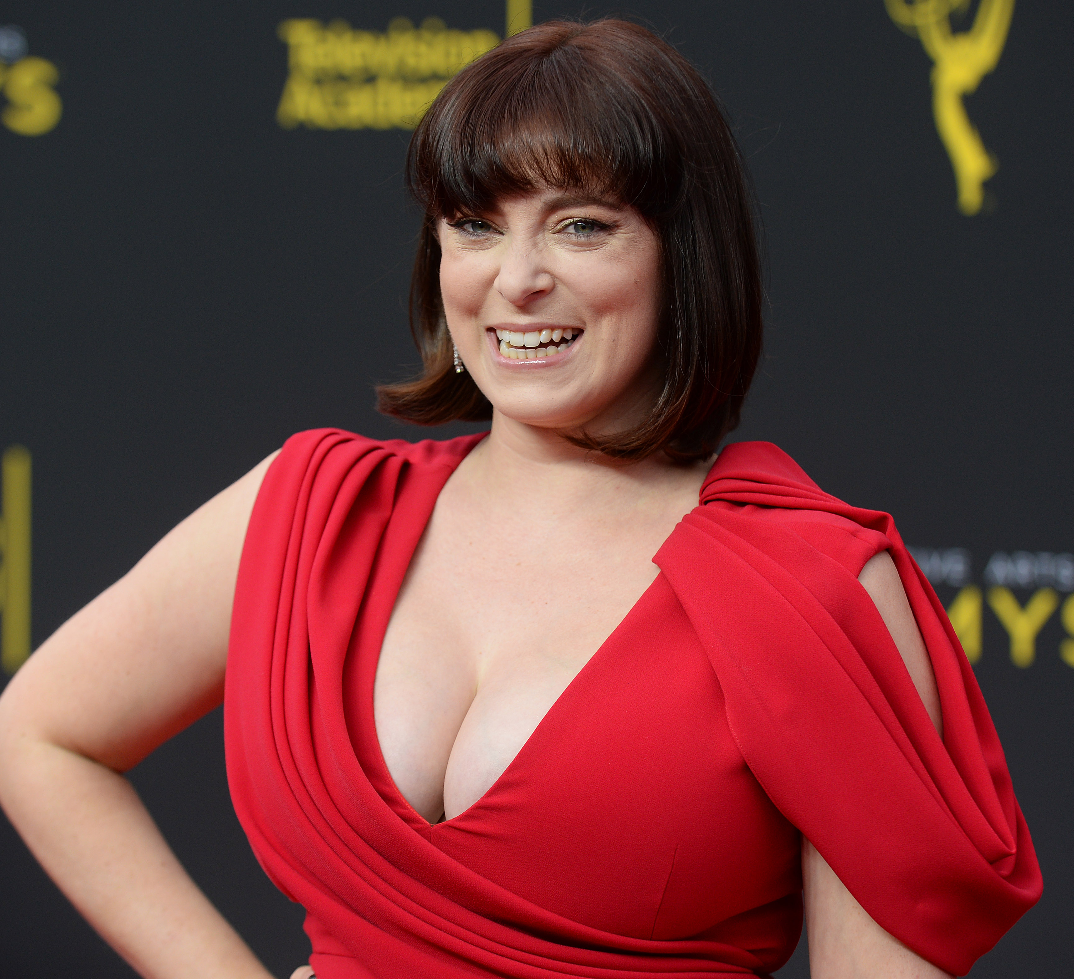 <p>Emmy- and Golden Globe-winning "Crazy Ex-Girlfriend" actress Rachel Bloom has long lamented her breasts. She even sang about them in the song "Heavy Boobs" on her old show. She also wrote about her chest in the foreword of Caitlin Brodnick's memoir about testing positive for the BRCA1 gene mutation "Dangerous Boobies: Breaking Up With My Time-Bomb Breasts," <a href="https://www.dailymail.co.uk/tvshowbiz/article-9890383/Crazy-Ex-Girlfriend-star-Rachel-Bloom-breast-reduction-DD-chest.html">MailOnline</a> reported. "Having been boy crazy from a young age, I was delighted when the boys I pined for finally started to notice me, with my boobs drawing their eyes to my more important but subtler features, such as my smile and personality. As I got older and gained weight/went on birth control, my boobs grew from a modest B to a 'Why do I look skanky even in a T-shirt?' DD," Rachel wrote. "Sometimes, they're big in a cartoonish way that doesn't feel like they're a part of my body. So, when I became a comedian, I had a choice: be objectified against my will or take charge of my image and show them off with an ironic brazenness." Keep reading to see Rachel right before and after her August 2021 breast reduction surgery...</p>