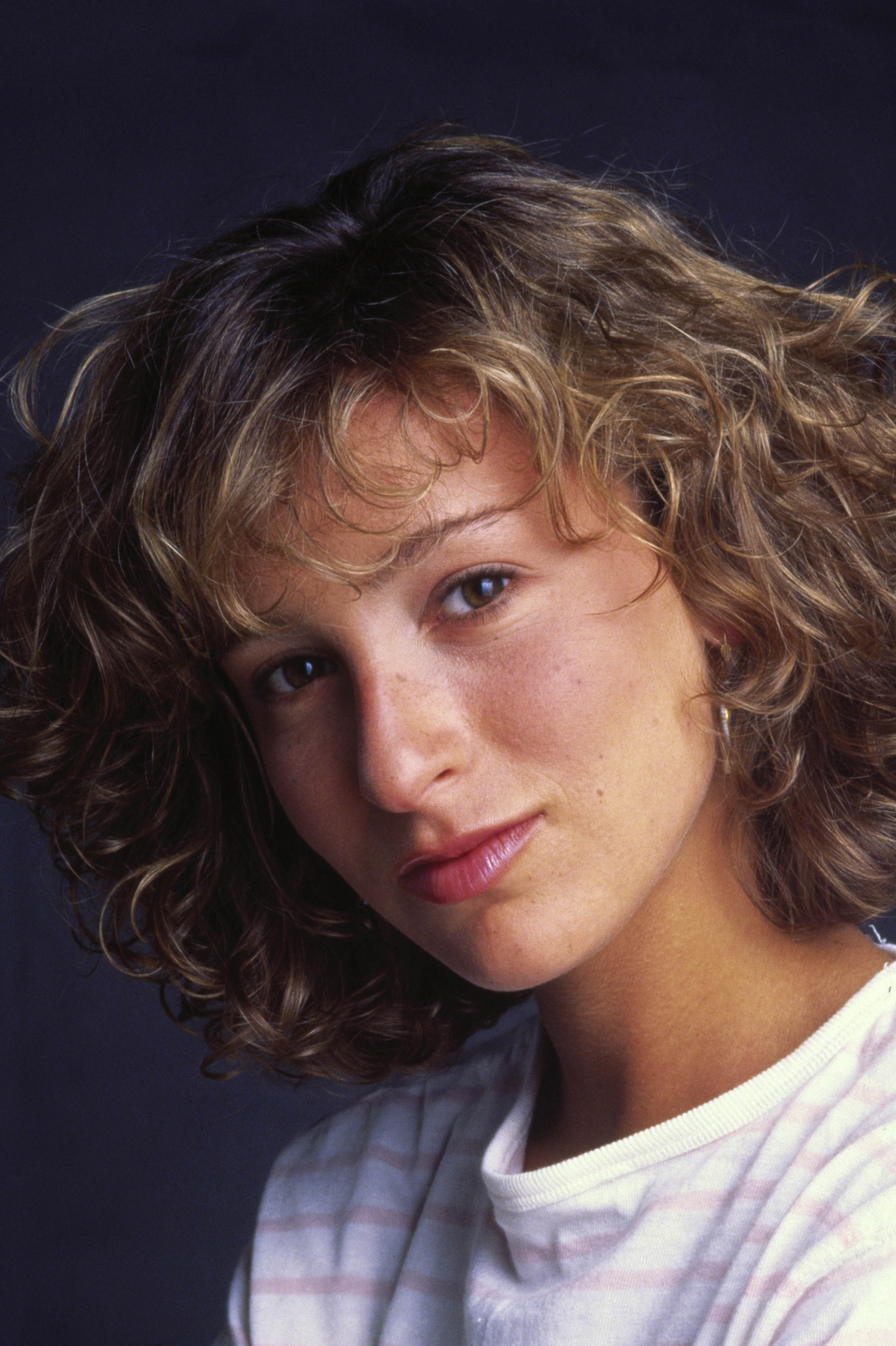 <p>A baby-faced Jennifer Grey looked all-natural in a promotional photo for "Red Dawn," which debuted in 1984, the same year she made her acting debut. A lot changed after that -- and not just where her career was concerned...</p>