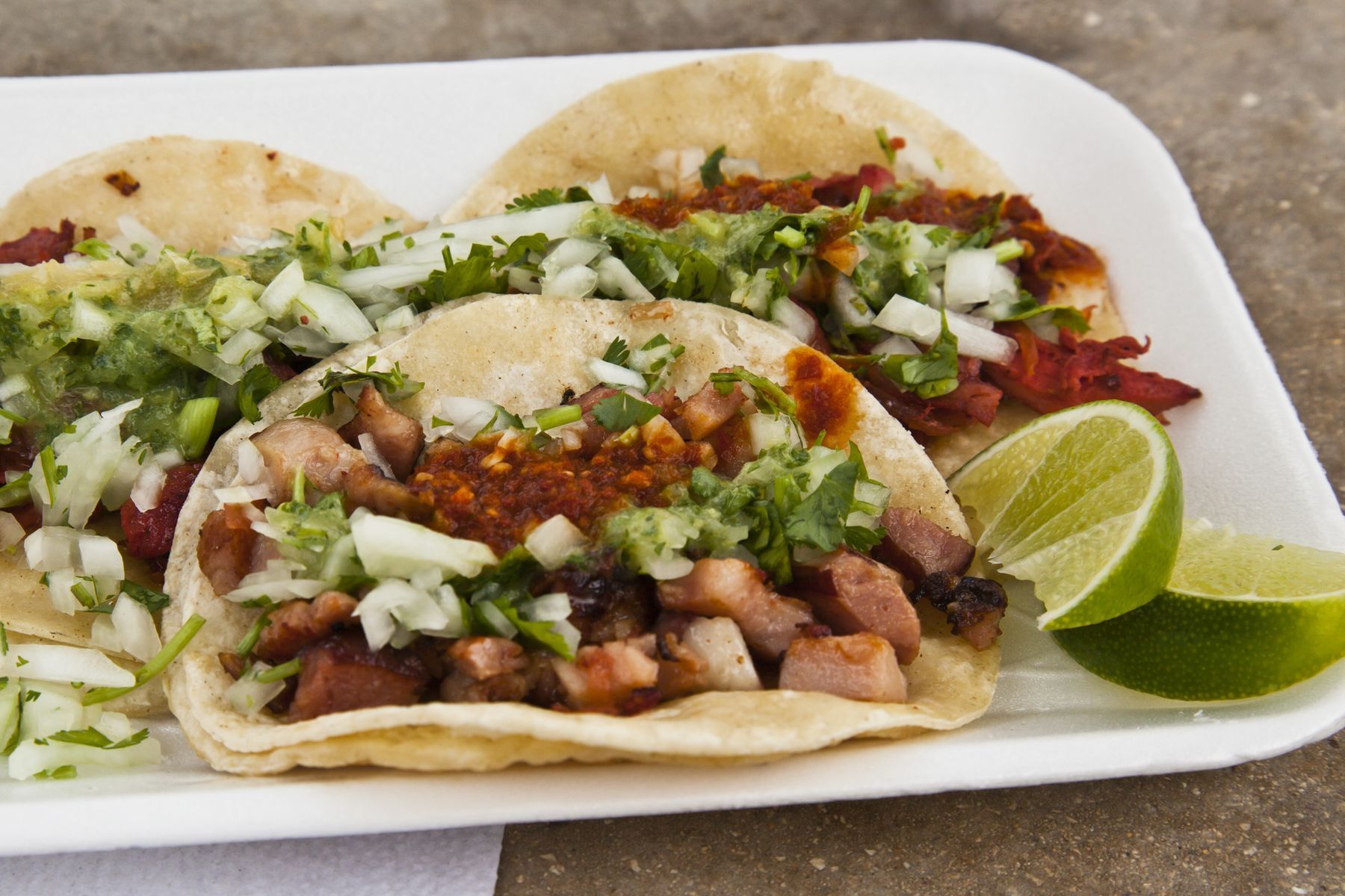 <p>Mexicans have hit the nail on the head with their tacos. This ideal street food can now be found all over the world. Whether filled with fish, meat, vegetables, or seafood, Mexican tacos will definitely be served with a <a href="https://www.masterclass.com/articles/a-guide-to-authentic-mexican-tacos" rel="noreferrer noopener">wedge of lime, cilantro, and chopped onions, not to mention your choice of salsa verde or salsa rojo</a>.</p>
