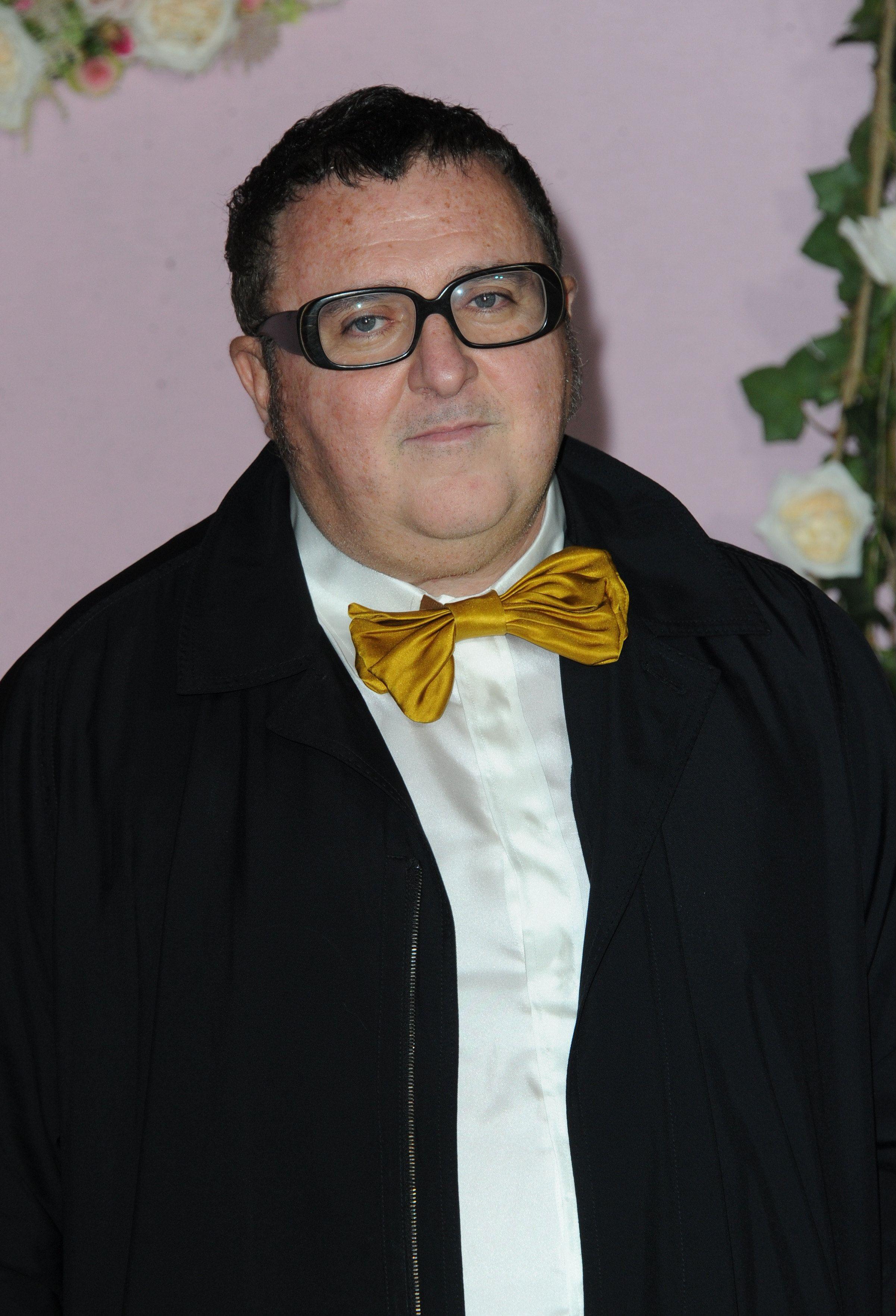 <p>Fashion designer Alber Elbaz died from complications of COVID-19 in Paris on April 24, 2021. He was 59. The company behind the Moroccan-born Israeli designer's latest venture, AZ Factory, confirmed the sad news to The New York Times. The man whose work was worn by celebrity clients including Beyonce, Natalie Portman, Harry Styles, Meryl Streep and more most notably served as the fashion director for Lanvin from 2001 to 2015.</p>
