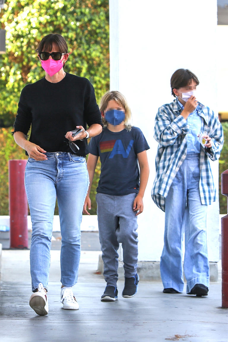 Jennifer Garner takes daughter Seraphina and son Samuel back to school shopping at Staples in Los Angeles on Aug. 22, 2021. The family of three looked super casual for the outing and all wore protective face masks.