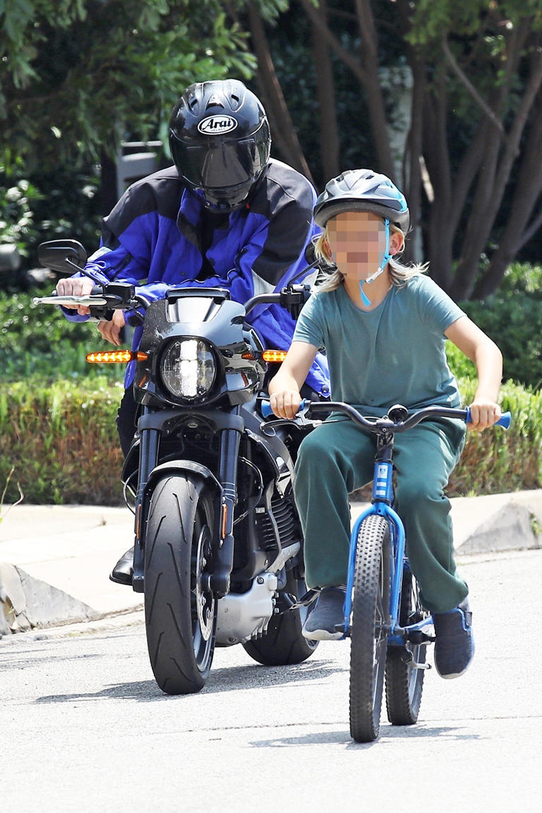 Ben Affleck goes for a cruise on his motorcycle as son Samuel rides by his side. Both made sure to protect themselves with helmets.
