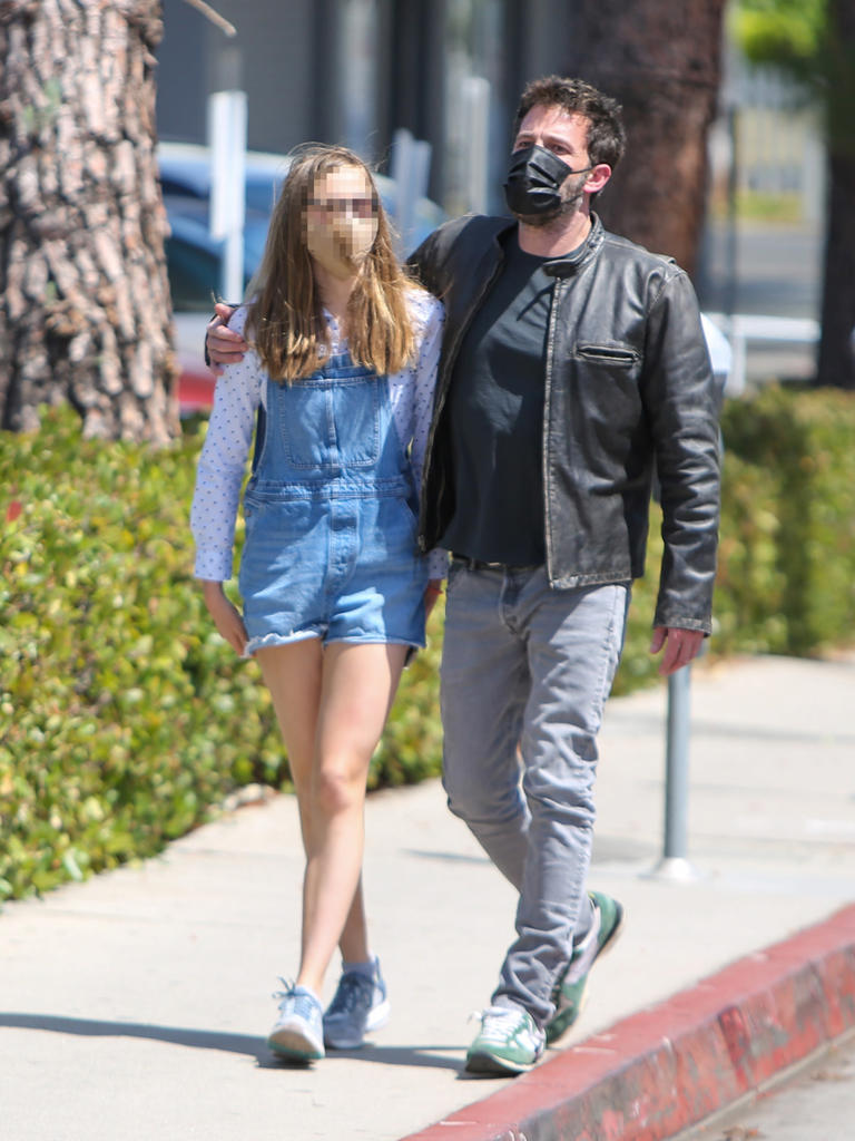 Ben Affleck and Violet head out for ice cream on May 22, 2021. The two wrapped their arms around each other as they took a stroll during the father/daughter outing.