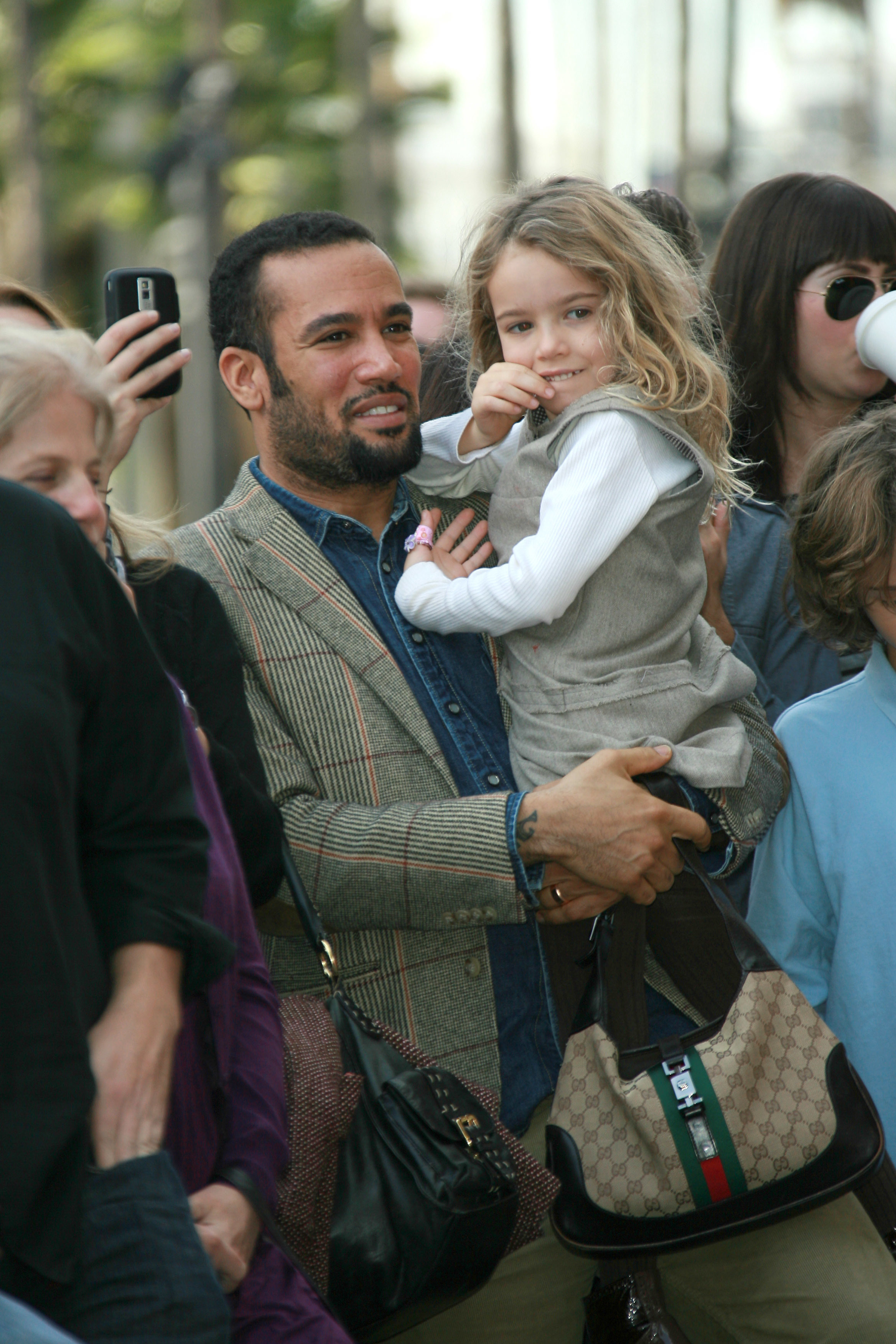 <p>Ben Harper carried then-5-year-old daughter Jaya, whose mom is the musician's ex-wife, actress Laura Dern, at family friend Mary Steenburgen's Hollywood Walk of Fame star ceremony on Dec. 16, 2009. Next, see how much Jaya (and big brother Ellery!) have grown...</p>
