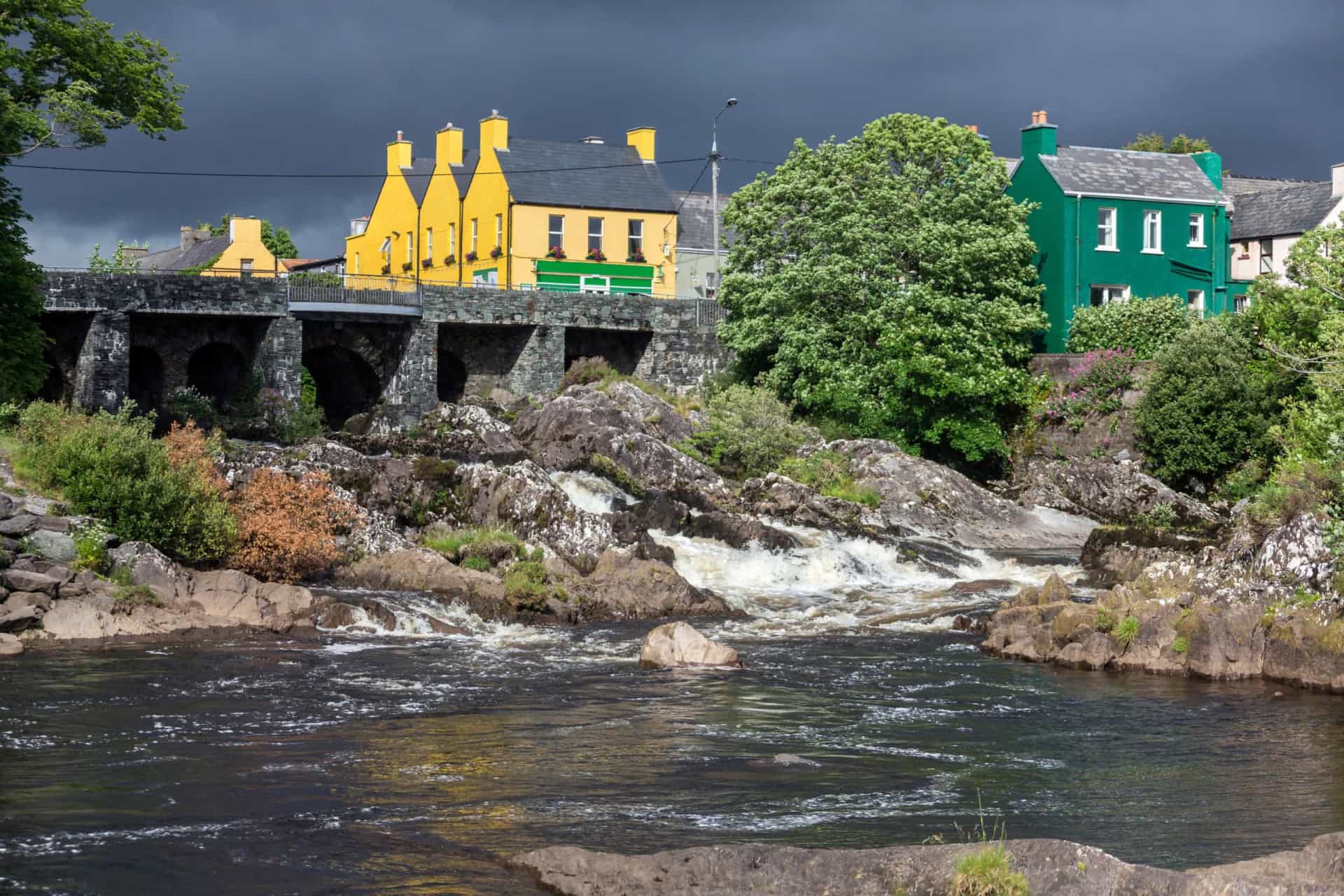<p>The charming village of Sneem is considered "the knot" in the Ring of Kerry—a 179-km-long (111 mi) circular tourist route in County Kerry that serves as a scenic bracelet enclosing a beautifully wild and stark landscape.</p>