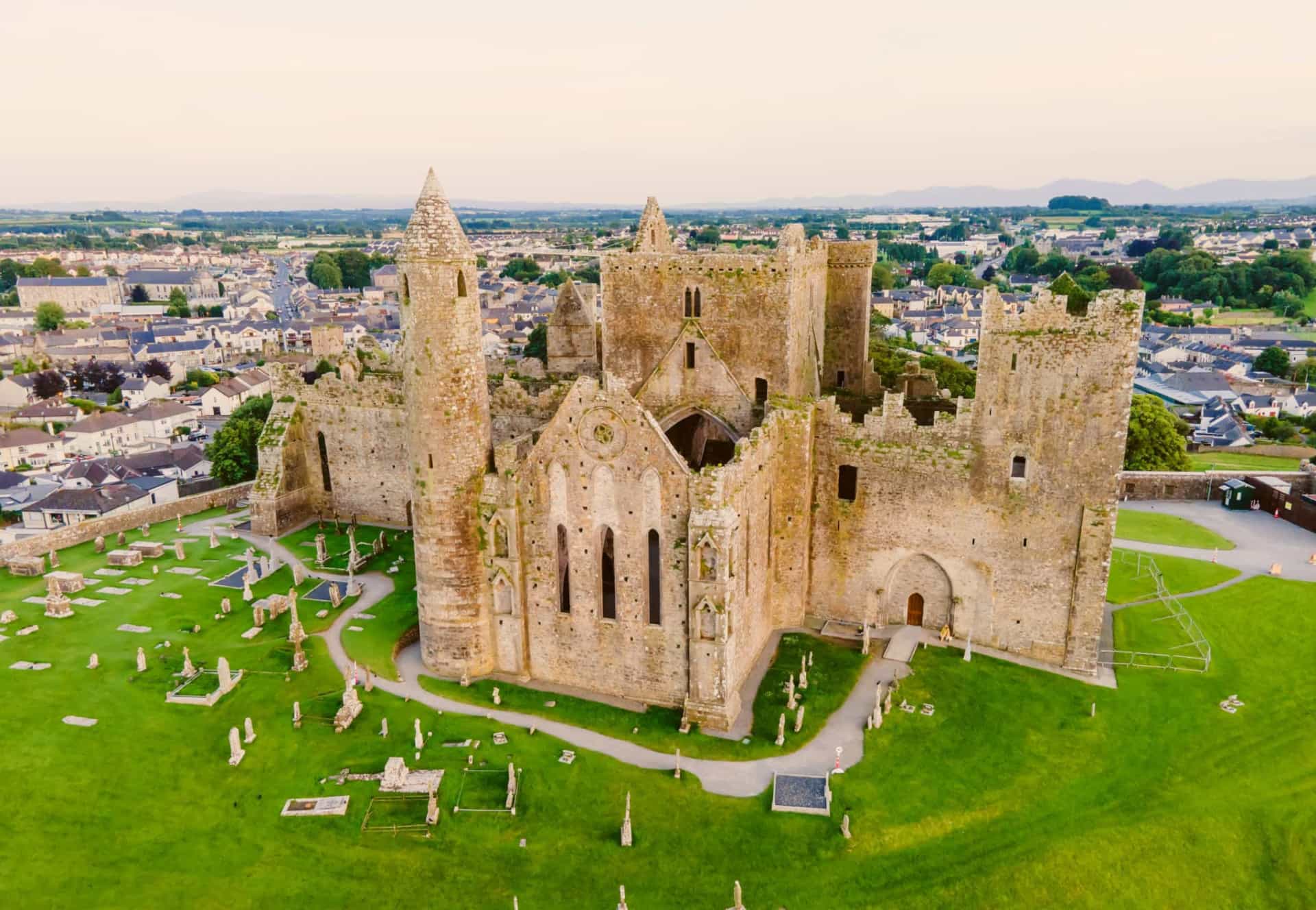<p>The Cashel skyline is dominated by the Rock of Cashel, a 12th-century site comprising the ruins of a cathedral, chapel, and a well-preserved round tower, the oldest and tallest structure in the historic complex and dating back to 1100.</p>
