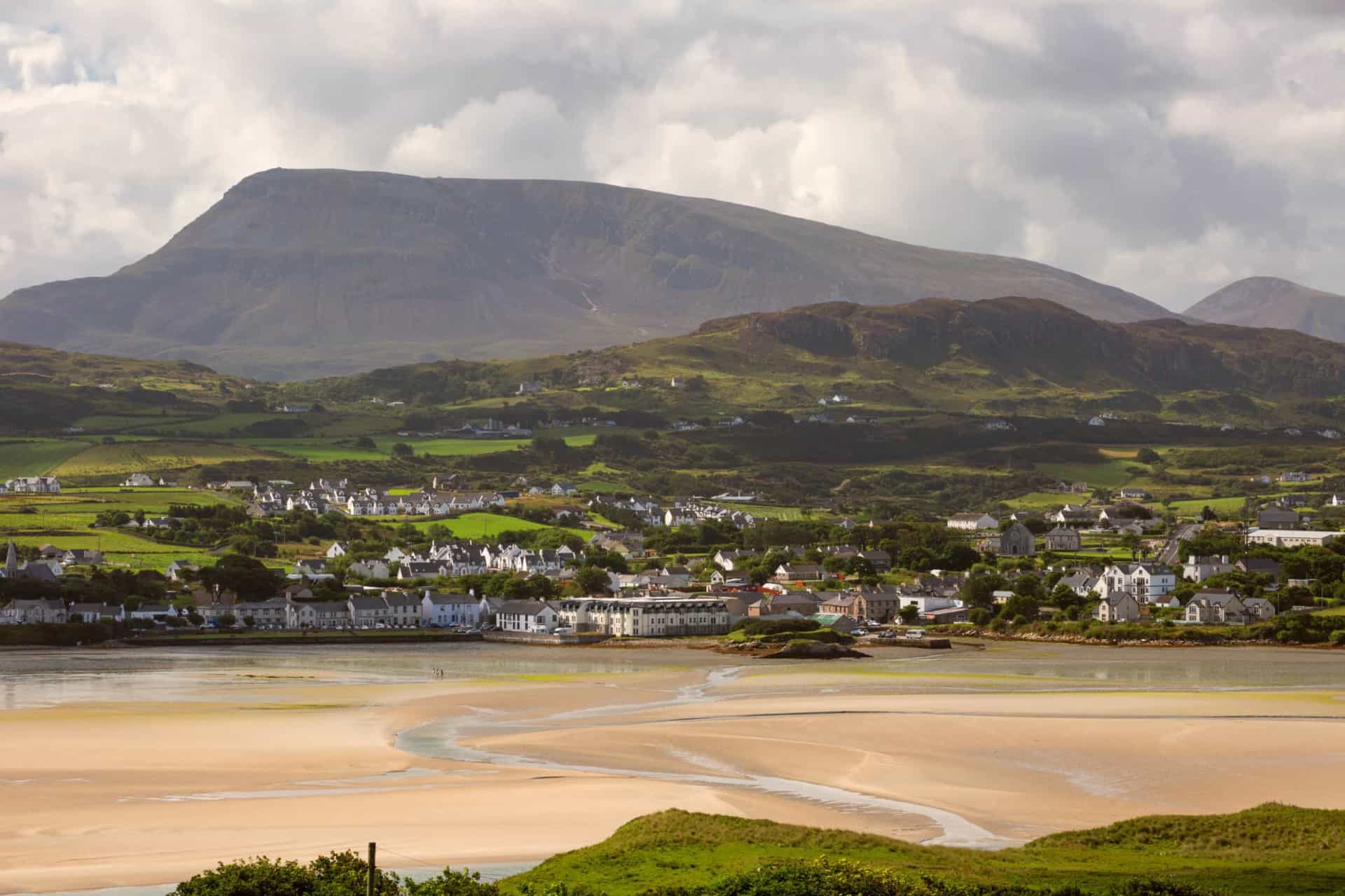 <p>This small market town lies on Donegal's north west coast, specifically the west side of Sheephaven Bay. A long sandy beach known as Killahoey Strand serves as an alluring summertime attraction, but Dunfanaghy's 19th-century veneer makes it a year-round proposition.</p>