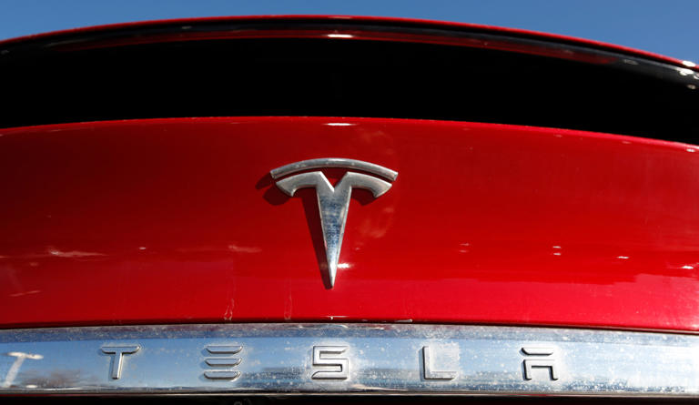 More than 1.6 million Tesla electric vehicles recalled in China for autopilot, lock issues