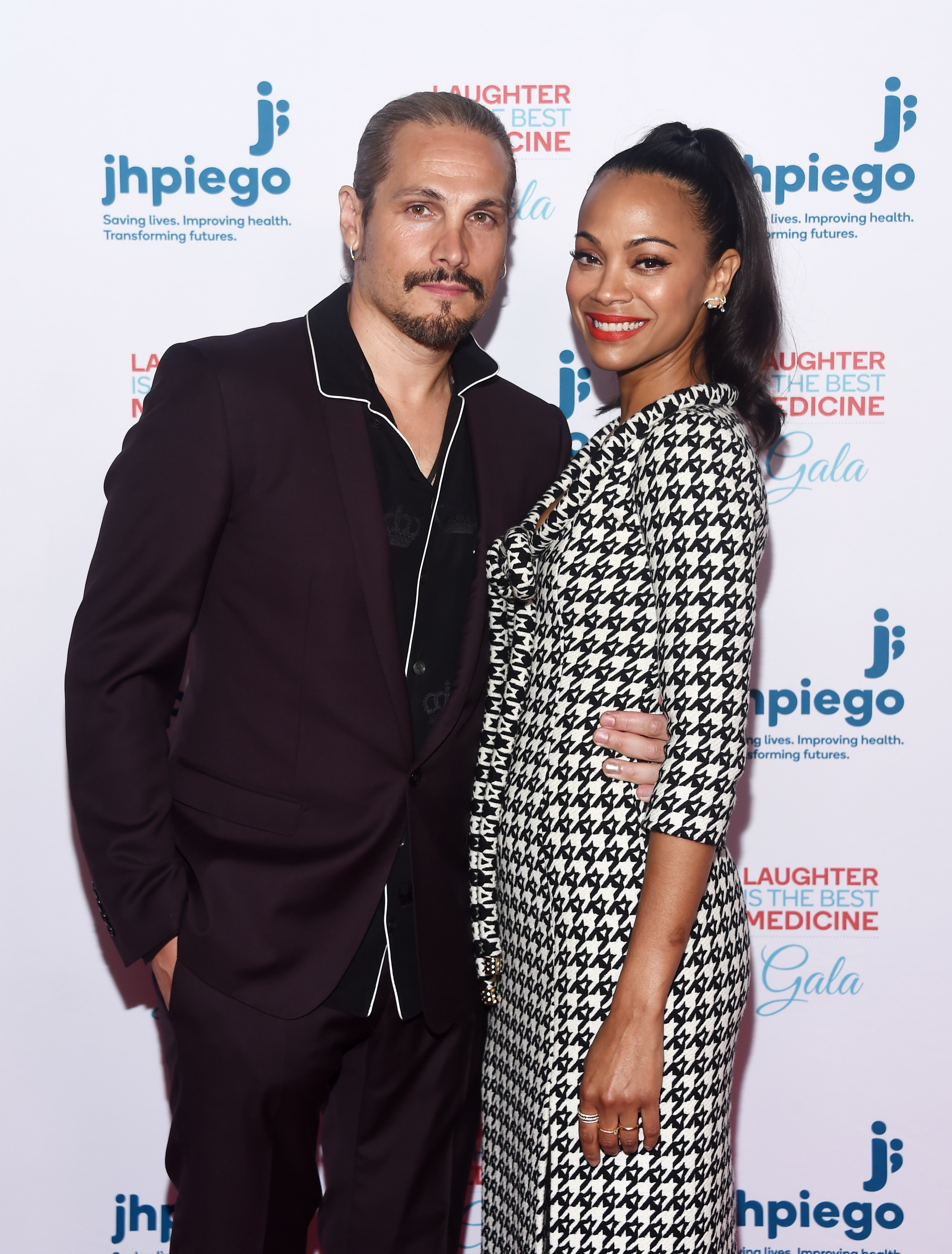 <p>It was love at first sight for these two! "I just saw him from behind. It was 6:30 in the morning, I was on a flight to New York," <a href="https://www.wonderwall.com/celebrity/profiles/overview/zoe-saldana-1120.article">Zoe Saldana</a> told USA Today in 2015 of meeting artist husband Marco Perego. "And I can't even describe to you, it was a vibration. He turned in that moment, because he felt the vibration as well. I know people don't believe in it; I didn't believe in it. ... It was enough that I felt it. And that was it." The couple have been married since 2013 and have three kids together.</p>