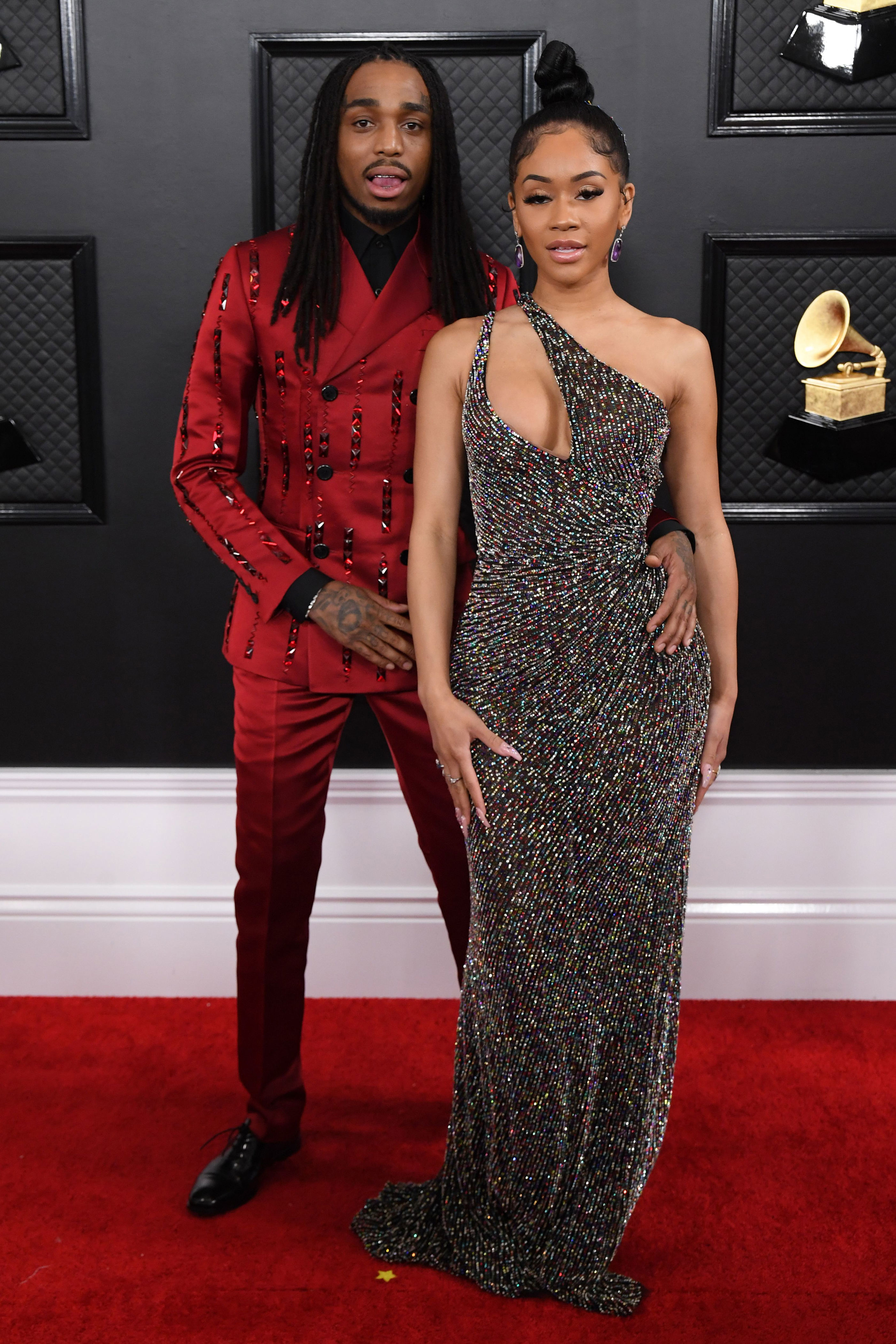 <p>During a joint interview with <a href="https://www.gq.com/story/quavo-saweetie-love-language">GQ</a> that debuted online in July 2020, Quavo and Saweetie dished on how they first connected on Instagram when the Migos rapper spotted her on his Explore page. He then researched the "Icy Grl" rapper before sliding into her DMs. "I told her, 'You an icy girl, you need a glacier boy,'" he recalled of his opening line. After chatting via direct messages, they graduated to phone calls. Months later, he invited her to a big party in Los Angeles. She then ghosted him. "I was trying to play hard to get," she revealed. They later had their first real date in Atlanta. After he choked on a crab cake at a fancy restaurant, he gave her a tour of the Quality Control Music studios. They then headed to a strip club, where a fight broke out. During the ensuing fray, Quavo and Saweetie got separated. He raced back to the car ... and momentarily forgot he was on a date. "She catches up and cussed me out in front of [the club]," he said, adding that they ultimately smoothed things over. They dated for more than two years before breaking up in 2021.</p>