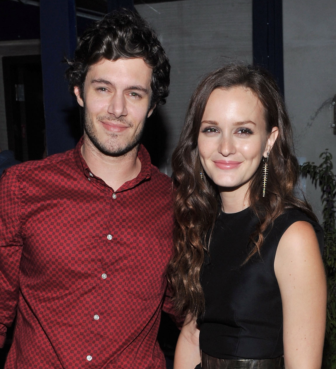 <p>A lot of people think Adam Brody met Leighton Meester on the set of their 2011 film "The Oranges." But it turns out they connected long before that -- though it was hardly romantic. On a March 2021 episode of Anna Faris's "Unqualified" podcast, as reported by <a href="http://www.justjared.com/2021/03/30/adam-brody-reveals-what-he-loves-most-about-leighton-meester-in-rare-comments-about-her/?=morehere">Just Jared</a>, Adam explained that he and Leighton met by chance at famed Los Angeles eatery Canter's Deli around 2006 -- just before his hit show "The O.C." came to an end and Leighton's big series "Gossip Girl" debuted. "Josh Schwartz produced both shows and literally the first time we met, that whole cast was eating at Canter's and I lived at Canter's for like, my entire 20s. And I was leaving, and he introduced all of us," Adam explained. He and Leighton then "bumped into" each other a few times over the next few years before both were cast in "The Oranges." "We did this movie together. I was seeing someone at the time… So we met kind of through mutual work friends off and on. And then we didn't get together [until] about a year after that movie, when I was single," he said. Still, Adam admitted, "I was very attracted to her from the jump. She's a heavenly creature. I thought she was gorgeous. And even when we did the movie, there was chemistry there, but I was seeing someone." When he became single again, he wasn't sure what to do. "I had no idea whether [Leighton] was a good person or not. And, in fact, kind of assumed she probably wasn't for like the first handful of years that I didn't know her, just because, I don't know, 'Gossip Girl.'" He soon realized he was wrong. "I was like, 'Oh, she's cool.' But I still didn't know, and that continued even to when we first started dating… And come to find out she's literally like Joan of Arc," Adam said. "She is the strongest, best person I know. She is my moral compass and North Star, and I just can't say enough good things about her character. It's crazy." They married in 2014 and now have two kids.</p>