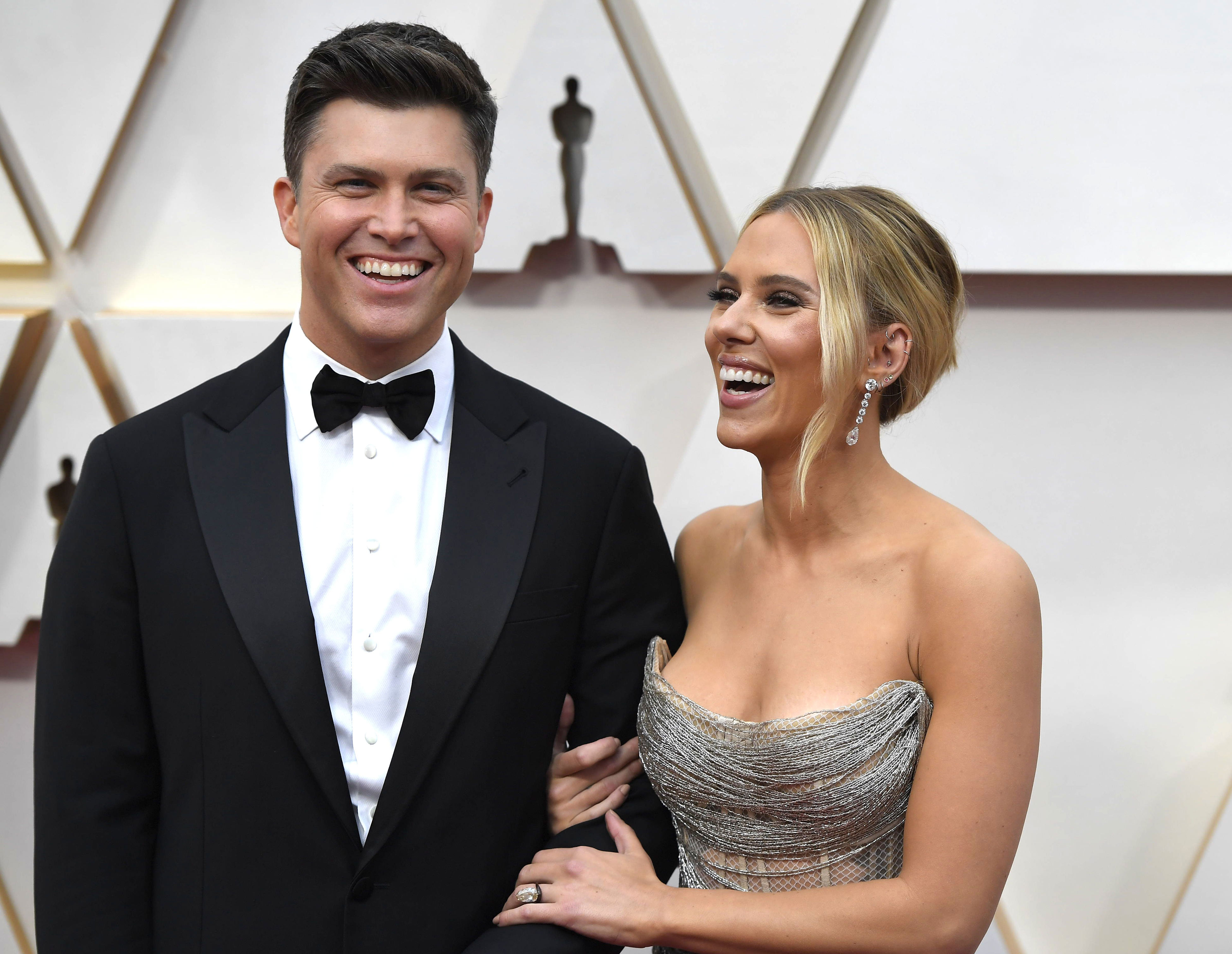 <p><span>In his 2020 memoir "A Very Punchable Face," Colin Jost revealed that he first met <a href="https://www.wonderwall.com/celebrity/profiles/overview/scarlett-johansson-397.article">Scarlett Johansson</a></span> when she hosted "Saturday Night Live" for the first time in 2006 while he was serving as a writer on the sketch-comedy series: "She claims that she remembers thinking I was 'cute' but I know what I looked like and that's not the word I would have used. ('Shaggy' would have been more generous. 'Slovenly' would have been more accurate)," he wrote. "I remember her being beautiful, smart, sweet and intimidatingly sophisticated," he continued. "And she had a grace and a smile that I've still never seen in any other human." They <a href="https://www.wonderwall.com/celebrity/scarlett-johansson-and-colin-jost-spotted-kissing-snl-afterparty-plus-more-news-3006717.gallery">finally started dating</a> after Scarlett hosted "SNL" for the fifth time in 2017. Colin and Scarlett <a href="https://www.wonderwall.com/celebrity/celeb-weddings-2020-3022551.gallery?photoId=397007">married in 2020</a>.</p>