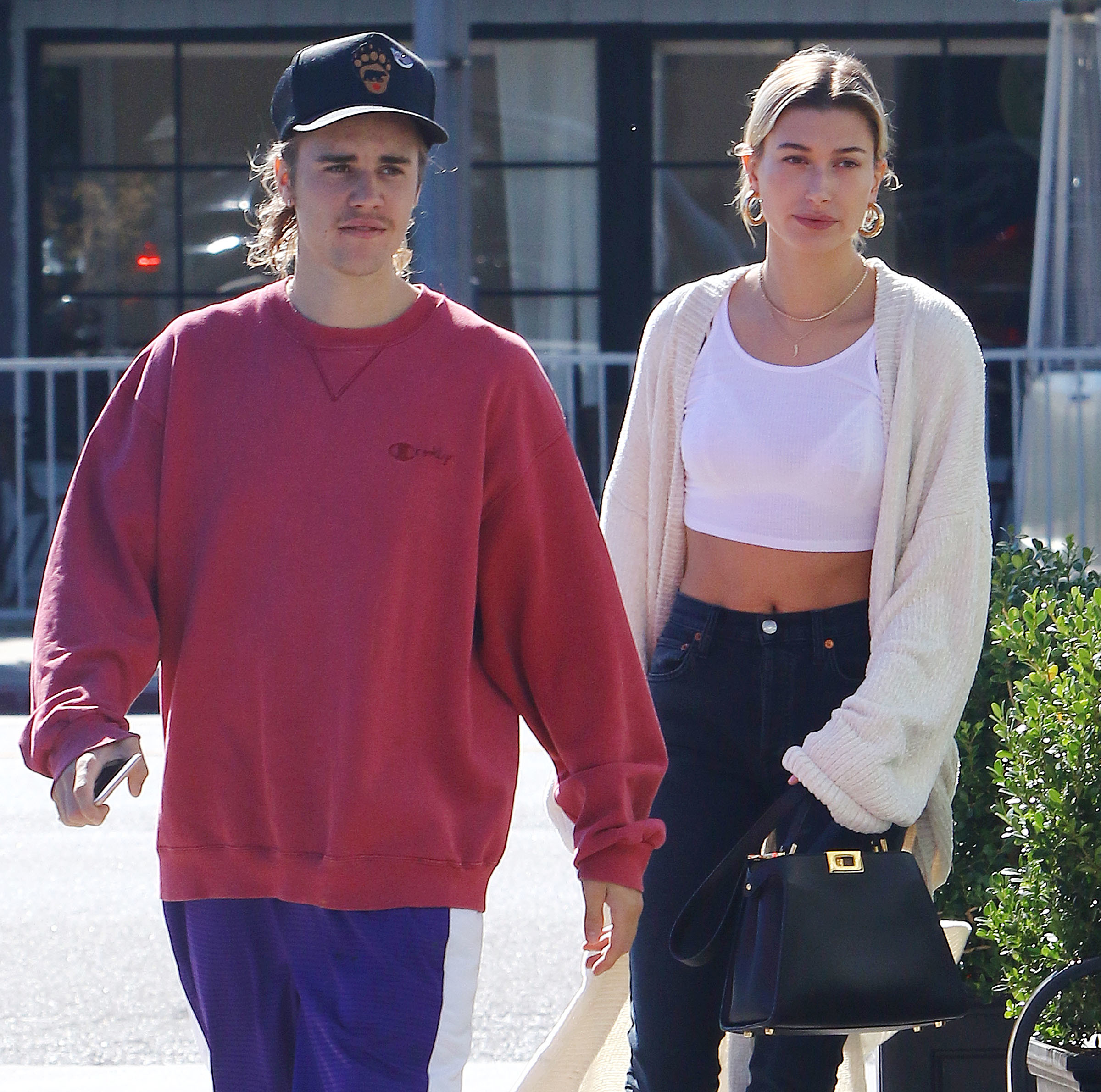 <p><a href="https://www.wonderwall.com/celebrity/profiles/overview/justin-bieber-1240.article">Justin Bieber</a> and wife Hailey Bieber met back in 2009 when she was 13 and he was 15 after her uncle, Alec Baldwin, got her family tickets to see the singer perform on "Today." "I was never a superfan, of him or of anyone," the former <a href="https://www.wonderwall.com/celebrity/profiles/overview/hailey-baldwin-1578.article">Hailey Baldwin</a> told Vogue in 2019. "It was never that crazed, screaming thing. I didn't think about it in any kind of way except for the fact that he was cute. Everybody had a crush on him. But for the first few years we had a weird age gap." Hailey's dad, actor Stephen Baldwin, and Justin's mom, Pattie Mallette -- both born-again Christians -- became friends after that "Today" show concert. (Hailey later revealed that Stephen invited Pattie and Justin to have dinner with their family and go bowling the next day.) It was years later that Justin and Hailey got close after they saw each other at Hillsong church services in New York City. "One day Justin walked into Hillsong and was like, 'Hey, you got older.' I was like, 'Yeah, what's up?" Hailey told Vogue. They ended up <a href="https://www.wonderwall.com/celebrity/couples/justin-bieber-hailey-baldwin-romance-retrospective-dating-relationship-timeline-3016794.gallery?photoId=174225">dating briefly in 2015 and 2016</a> and rekindled things three years later -- this time for good. During a February 2020 appearance on "The Tonight Show With Jimmy Fallon," Hailey revealed what sparked them to reconnect. "Last time I was [on this show], we did this little party trick where I opened a Corona bottle with my teeth," Hailey explained. "The next morning -- after the interview had aired -- I got a certain phone call from a certain someone and it was a little like, 'Hey, how are you? I saw you on 'Jimmy Fallon' last night. You were looking really good. I loved that trick that you did, I had no idea that you can do that. It was so cool.' Cut to, I'm now married to that certain someone." Hailey <a href="https://www.wonderwall.com/news/its-true-justin-bieber-did-marry-hailey-baldwin-nyc-courthouse-without-prenup-3016655.article">officially became Mrs. Bieber</a> when they eloped in September 2018 and they celebrated their love again with a <a href="https://www.wonderwall.com/celebrity/justin-bieber-and-hailey-biebers-wedding-all-details-we-know-so-far-3021213.article">formal religious wedding</a> in September 2019.</p>