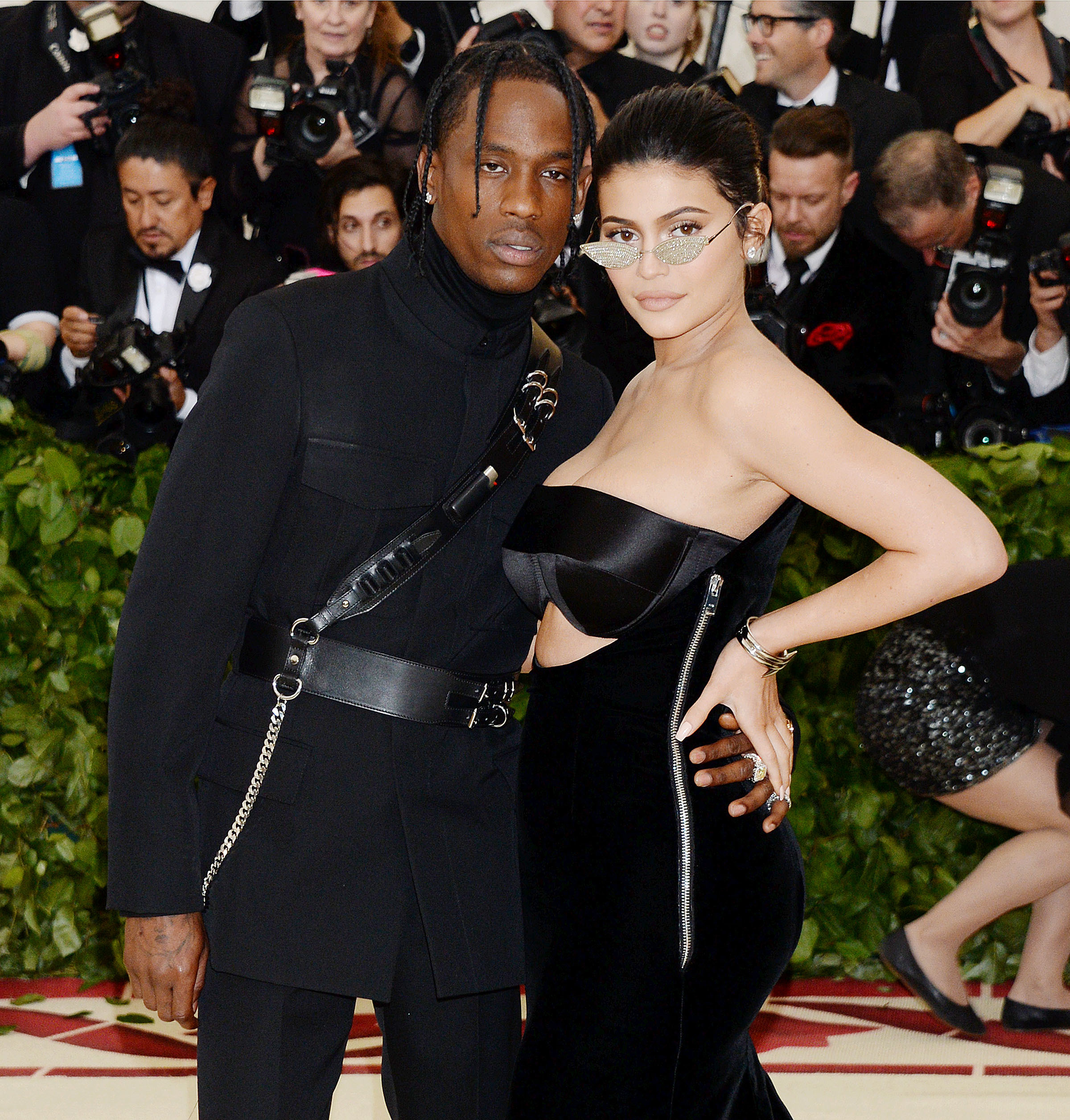 <p><a href="https://www.wonderwall.com/celebrity/profiles/overview/kylie-jenner-1413.article">Kylie Jenner</a> and Travis Scott don't remember exactly where they first met, but their first date -- which she says wasn't even really a first date, but more of a hang that went well, <a href="https://www.gq.com/story/kylie-travis-cover-2018">GQ</a> reported in July 2018 -- was at the <a href="https://www.wonderwall.com/celebrity/coachella-2017-vanessa-hudgens-alessandra-ambrosio-and-more-stars-3005324.gallery">2017 Coachella Valley Music and Arts Festival</a>. "Coachella was one of the stops on his tour," Kylie told GQ. "So he said, 'I'm going back on tour -- what do we want to do about <i>this</i>?' Because we obviously liked each other. And I was like, 'I guess I'm going with you.' I really jumped on the [tour] bus. And then we rode off into the sunset. I did the whole tour with him." That tour is where they really got to know one another and, it seems clear now, where she got pregnant with their daughter, <a href="https://www.wonderwall.com/news/kylie-jenner-reveals-her-babys-name-3012473.article">Stormi, who was born</a> in February 2018. "We had a lot of downtime. It was organic. And we would just go to these random cities," Kylie explained. "We got to not be who we really were. Like, if we were in L.A., I feel like it would've been way different. Everything happened for a reason. We weren't going out as 'Kylie and Trav.' We would just be in Cleveland, walking the street for hours. We would go on walks, and no one would bother us." The pair split in 2019 but <a href="https://www.tmz.com/2021/05/21/kylie-jenner-travis-scott-back-together-not-exclusive-open-relationship/">reconnected romantically</a> in 2021. In February 2022, they welcomed <a href="https://www.wonderwall.com/celebrity/celebrities-who-gave-birth-in-2022-stars-who-welcomed-babies-or-adopted-this-year-546256.gallery">son Wolf</a>.</p>