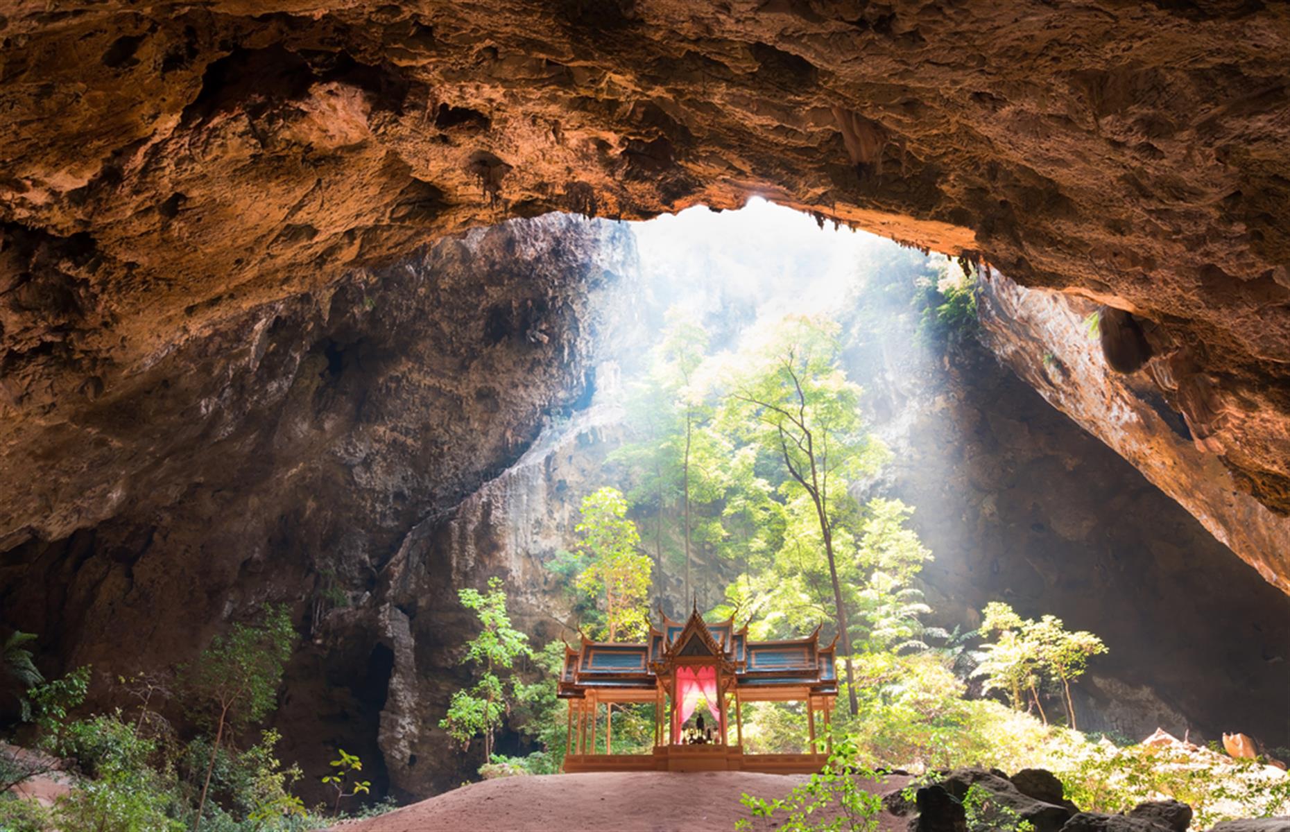 <p>Phraya Nakhon Cave in Khao Sam Roi Yot National Park is spectacular in its own right, but it's the little pavilion bathed in light inside which really makes it special. Want to visit? You've got quite the trek ahead of you: a boat ride, 1,450 feet (442m) of uneven and steep steps, then a slippery pathway into the cavern. Start early, the light in this beautiful cave looks best in the morning.</p>