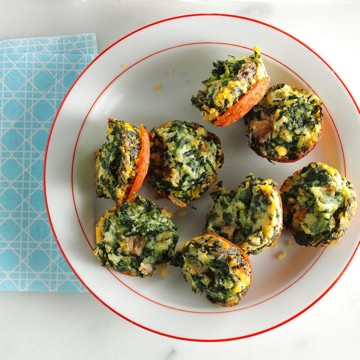 <p>People can't get enough of these pop-in-your-mouth mini frittatas. They're a cinch to make, freeze well and the recipe easily doubles for a crowd. —Nancy Statkevicus, Tucson, Arizona</p> <div class="listicle-page__buttons"> <div class="listicle-page__cta-button"><a href='https://www.tasteofhome.com/recipes/mini-spinach-frittatas/'>Go to Recipe</a></div> </div>
