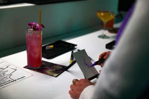 Artechouse guests can sip cocktails and create a tiny piece of art that’s showcased behind the bar. 