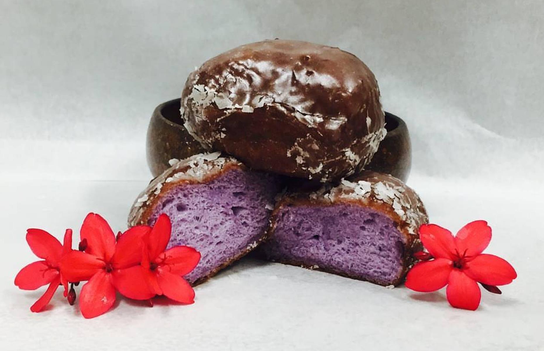 <p>Hawaiian poi-glazed donuts are made with taro root, which is boiled and pounded into a paste then added to the donut batter for a striking purple hue. <a href="https://www.facebook.com/kamehamehabakeryhawaii/?ref=page_internal">Kamehameha Bakery</a> has been making its Poi Glaze donuts and other malasadas – yeast-raised donut balls originating from Portugal – since 1978, and they’re as beautiful as ever.</p>