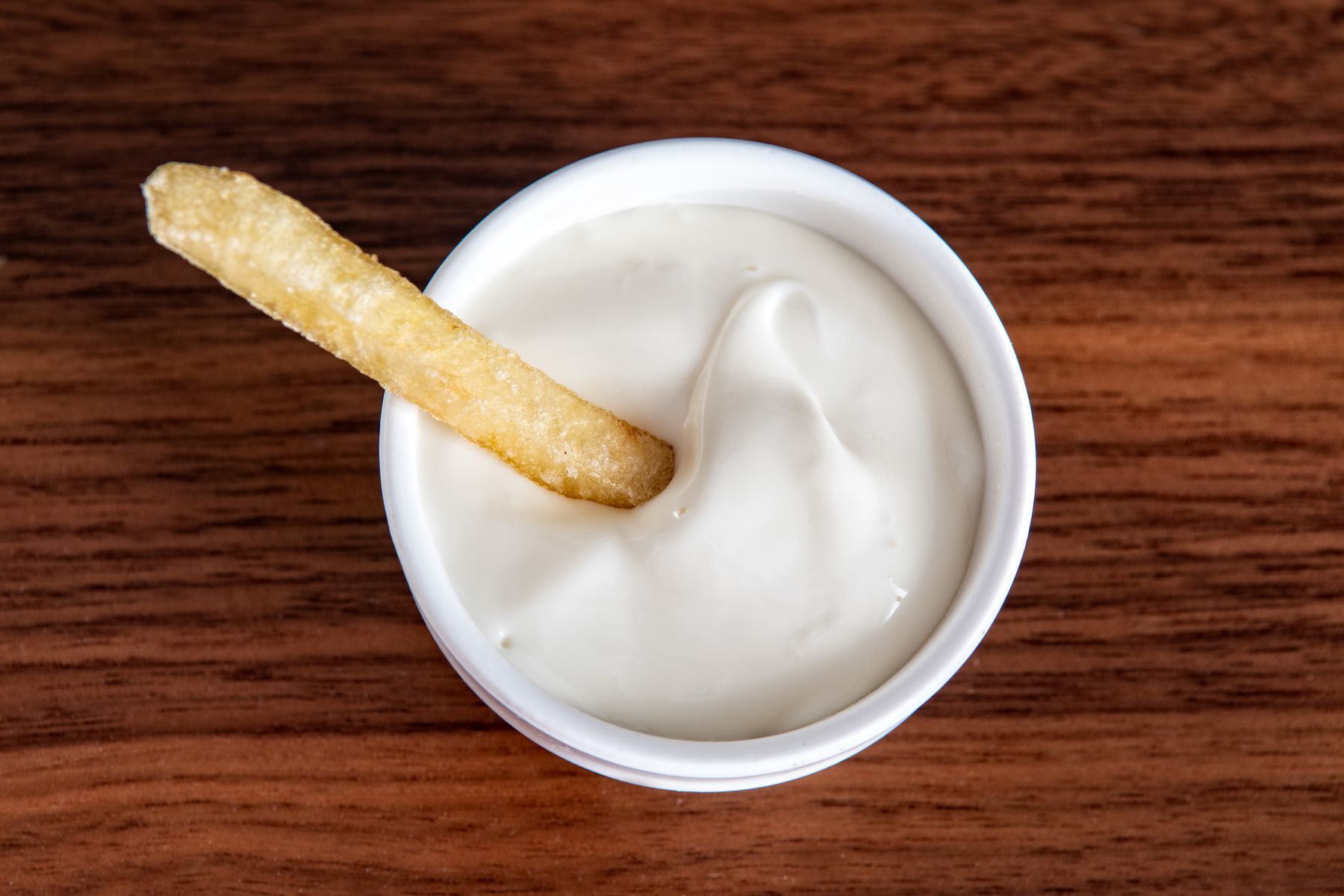 <p>It’s hard to know where this delicious tradition originated, but Wendy’s fast-food chain has made <a href="https://www.thrillist.com/eat/nation/french-fries-wendys-ice-cream-frosty-recipe-science">fries dipped in a milkshake</a> its trademark treat!</p>