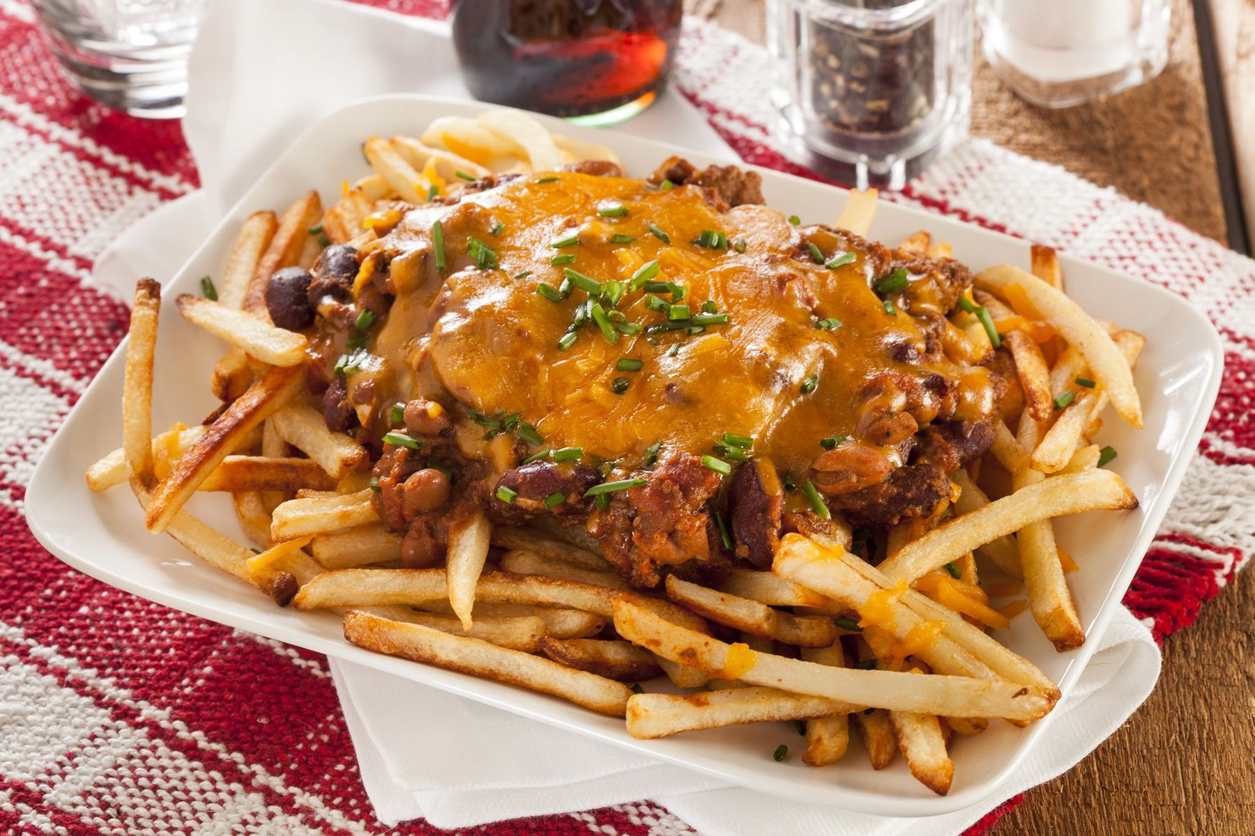 <p>Check out the <a href="https://www.foodnetwork.com/recipes/sandra-lee/chili-fries-recipe-1947622">American version of Quebec’s poutine</a>. Top fresh fries with a good portion of chili con carne (or vegetarian), then cover with cheddar cheese (grated or as a sauce). Everyone loves chili fries!</p>