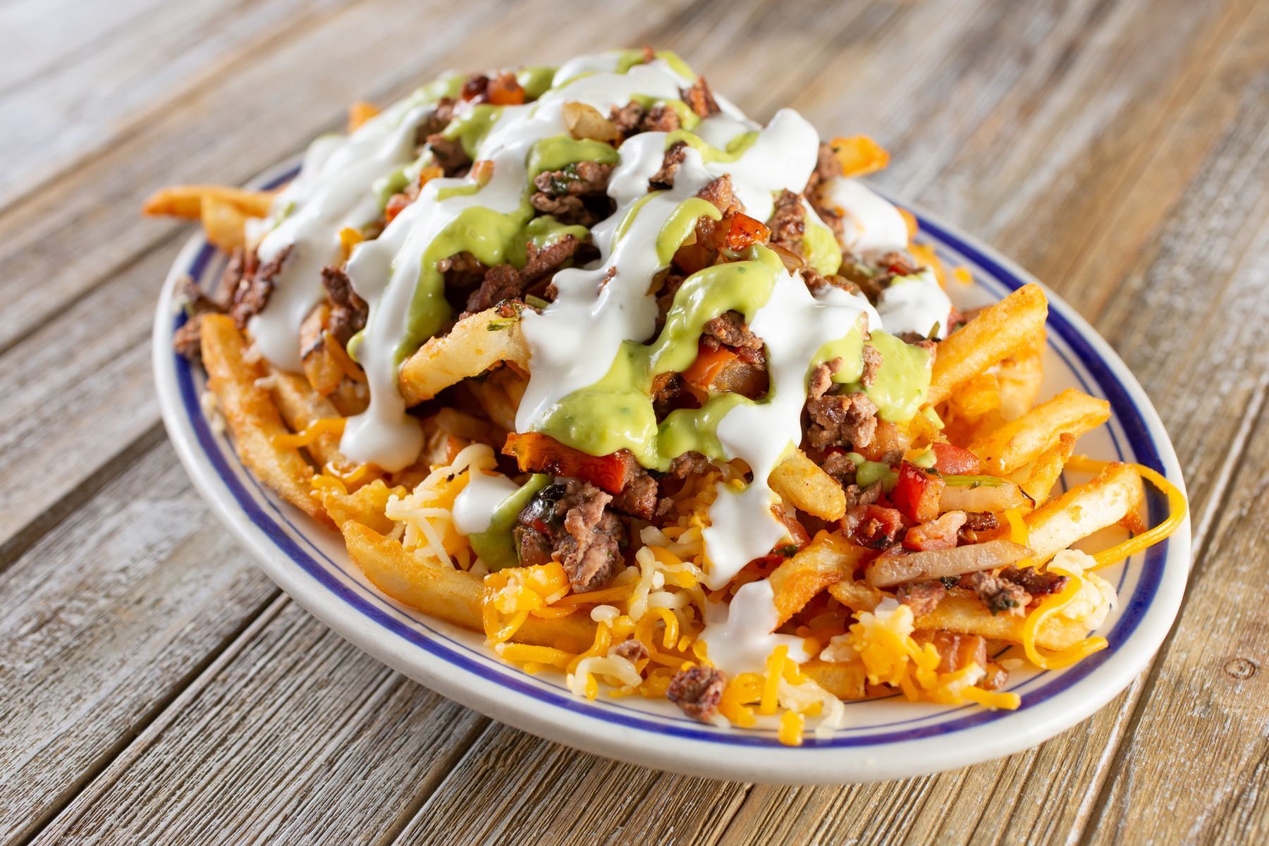 <p>Replace the traditional corn chips with crispy French fries for a whole <a href="https://www.cakenknife.com/french-fry-nachos/">new kind of nacho</a>!</p>