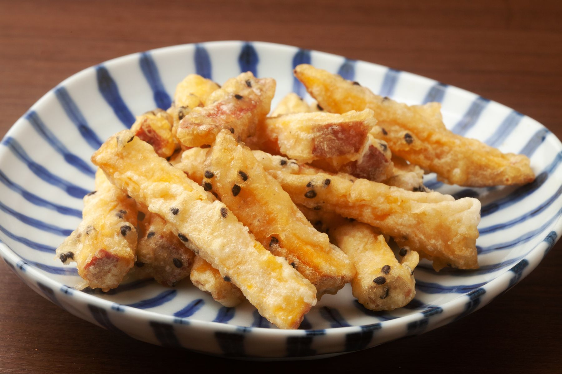 <p>Shrimp aren’t the only food that goes great with a crispy tempura coating. Add <a href="https://thissillygirlskitchen.com/coconut-tempura-sweet-potato-fries-with-curry-aioli/">coconut flakes</a> to your tempura recipe for a surprising twist!</p>