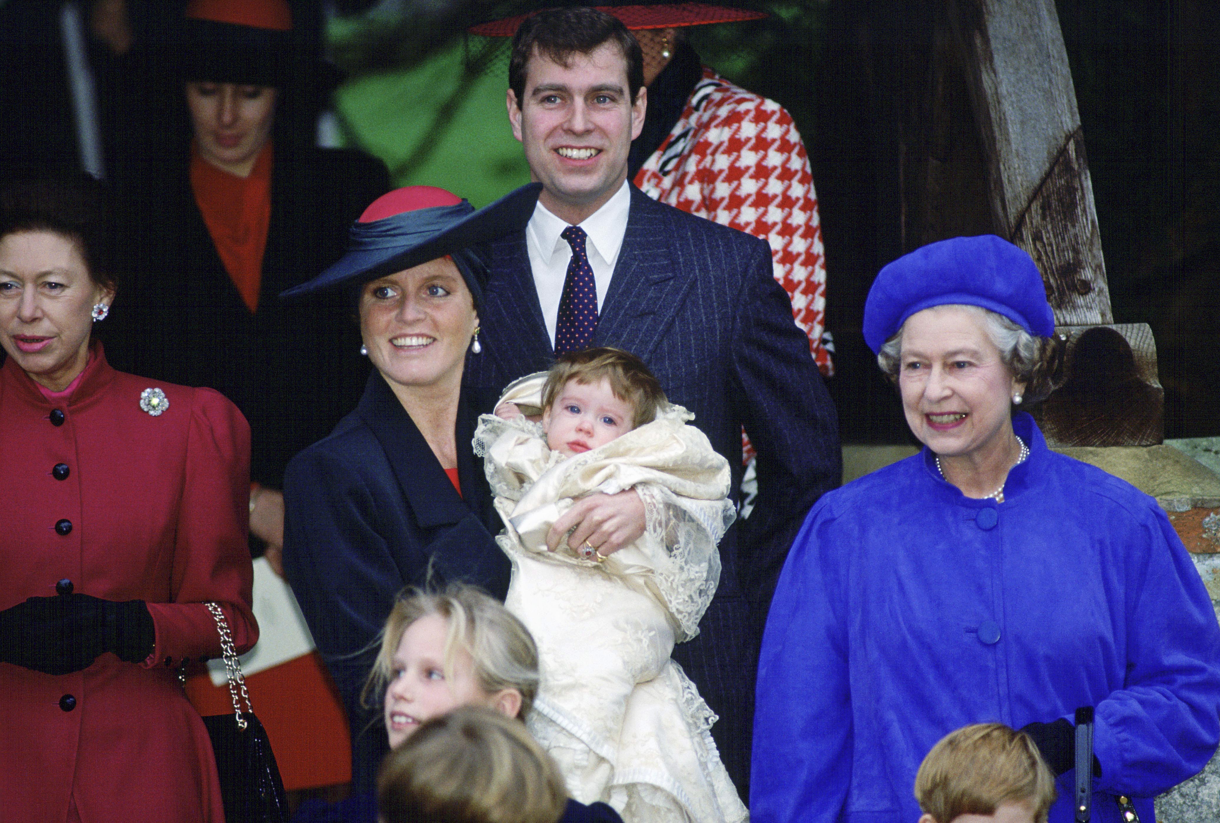 <p>Queen Elizabeth II was the guest of honor at granddaughter Princess Eugenie's christening at St. Mary Magdalene Church on the monarch's Sandringham estate in England's Norfolk region on Dec. 23, 1990. Princess Margaret, Sarah, Duchess of York, Prince Andrew and Zara Phillips (now Zara Tindall) are also pictured.</p>