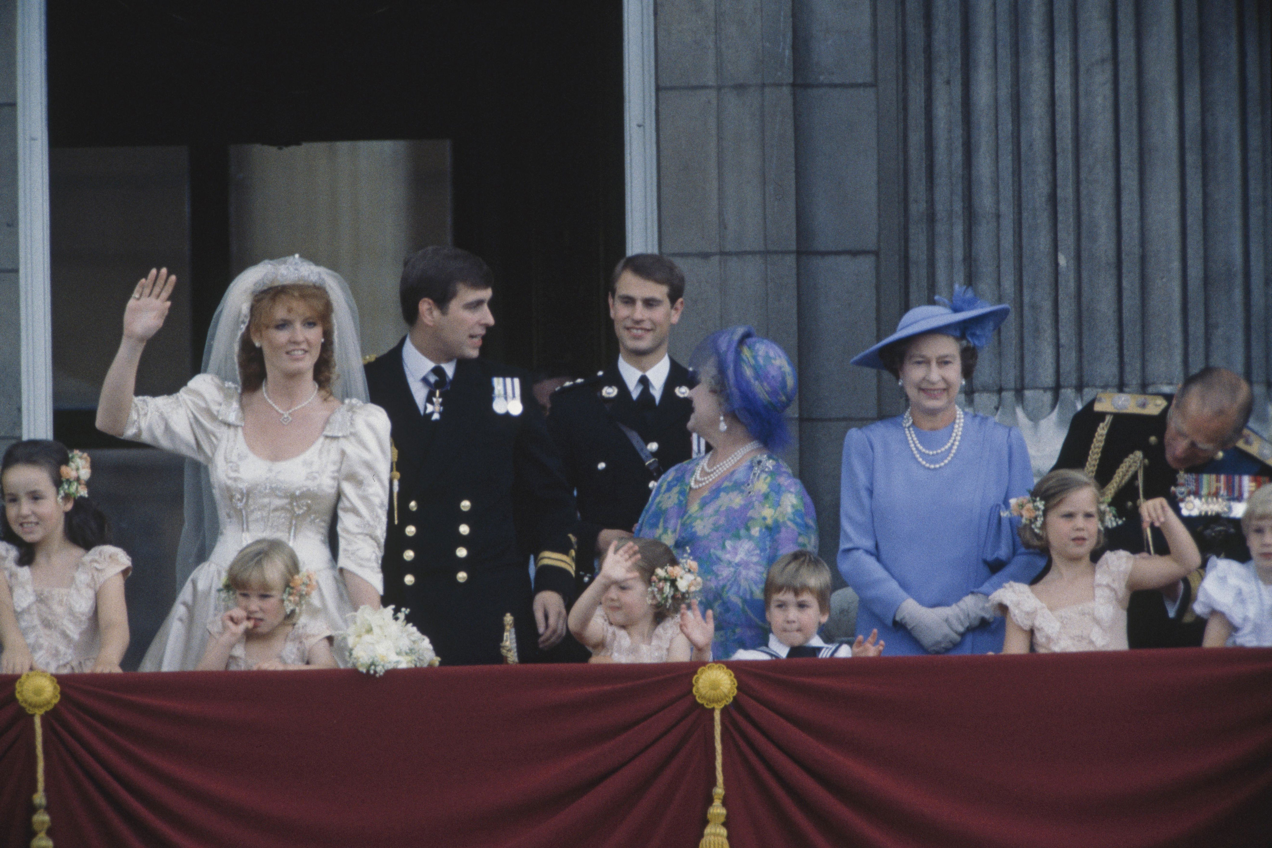 <p>Queen Elizabeth II was among the members of the British royal family who joined her second son, Prince Andrew, and his new bride, Sarah, Duchess of York, on the balcony at Buckingham Palace in London after the couple's wedding on July 23, 1986.</p>