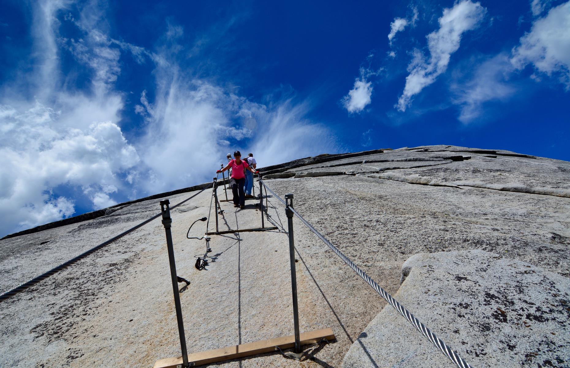 Treating you to jaw-dropping panoramas over the heart of the American West, climbing Half Dome is an adventure you won’t forget. It’s not for the faint of heart, though, as the ascent is strenuous. The defining feature of this climb are the iron cables (via ferrata) towards the summit, which allow you to reach the top without rock-climbing expertise. Just remember to bring a harness or go with an experienced guide.
