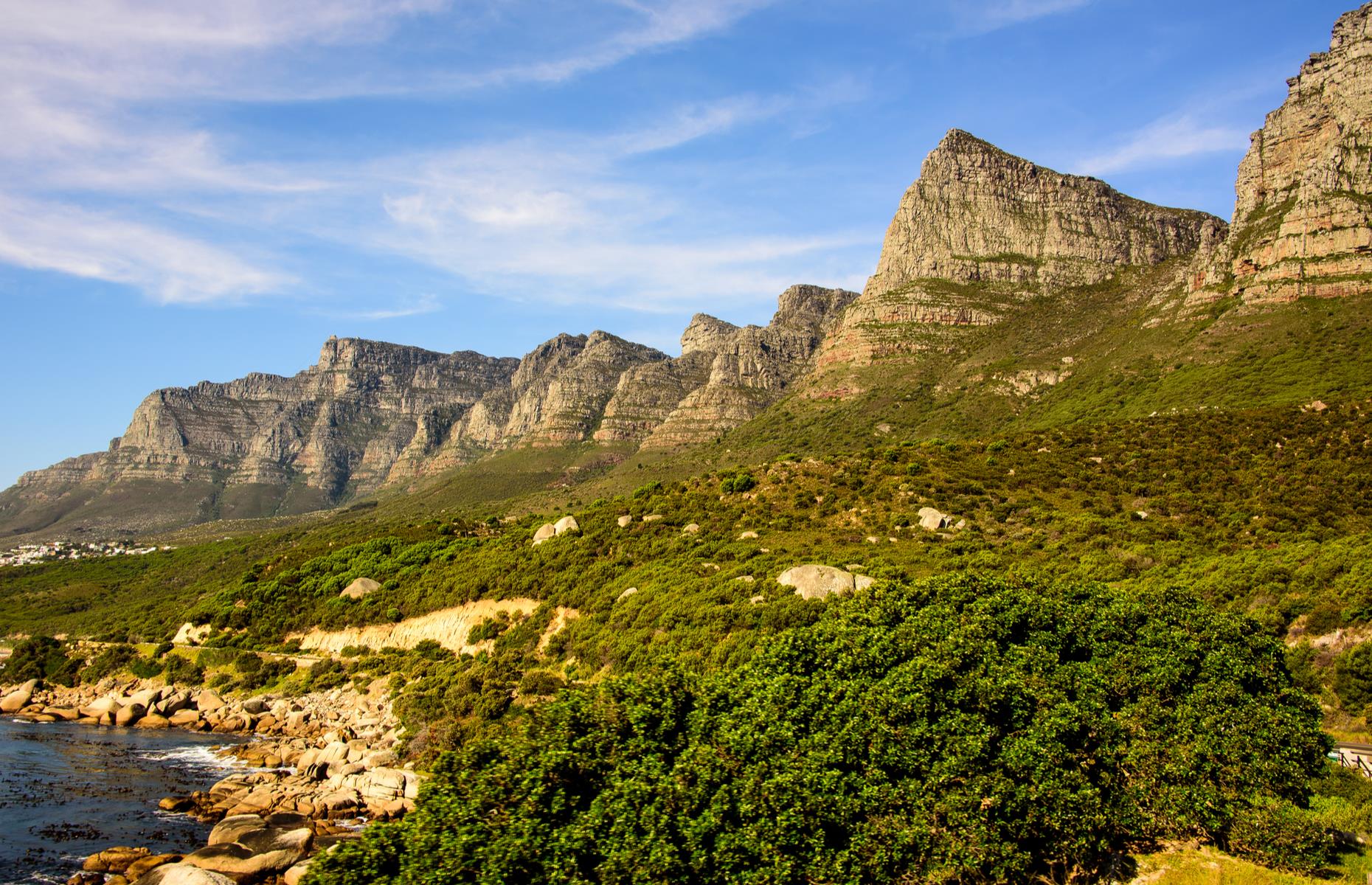 <p>Pass through the jungle-esque Skeleton Gorge on your way up the mountain. Or take the more challenging Kasteelspoort route along the jagged Twelve Apostles cliffs, and you’ll be rewarded with a seemingly death-defying photo opportunity at the Diving Board rock formation. Want a lift down? Take the Table Mountain Cable Car. </p>  <p><a href="https://www.loveexploring.com/galleries/115994/the-worlds-most-beautiful-remote-mountain-cabins?page=1"><strong>Check out the world's most beautiful remote mountain cabins</strong></a></p>
