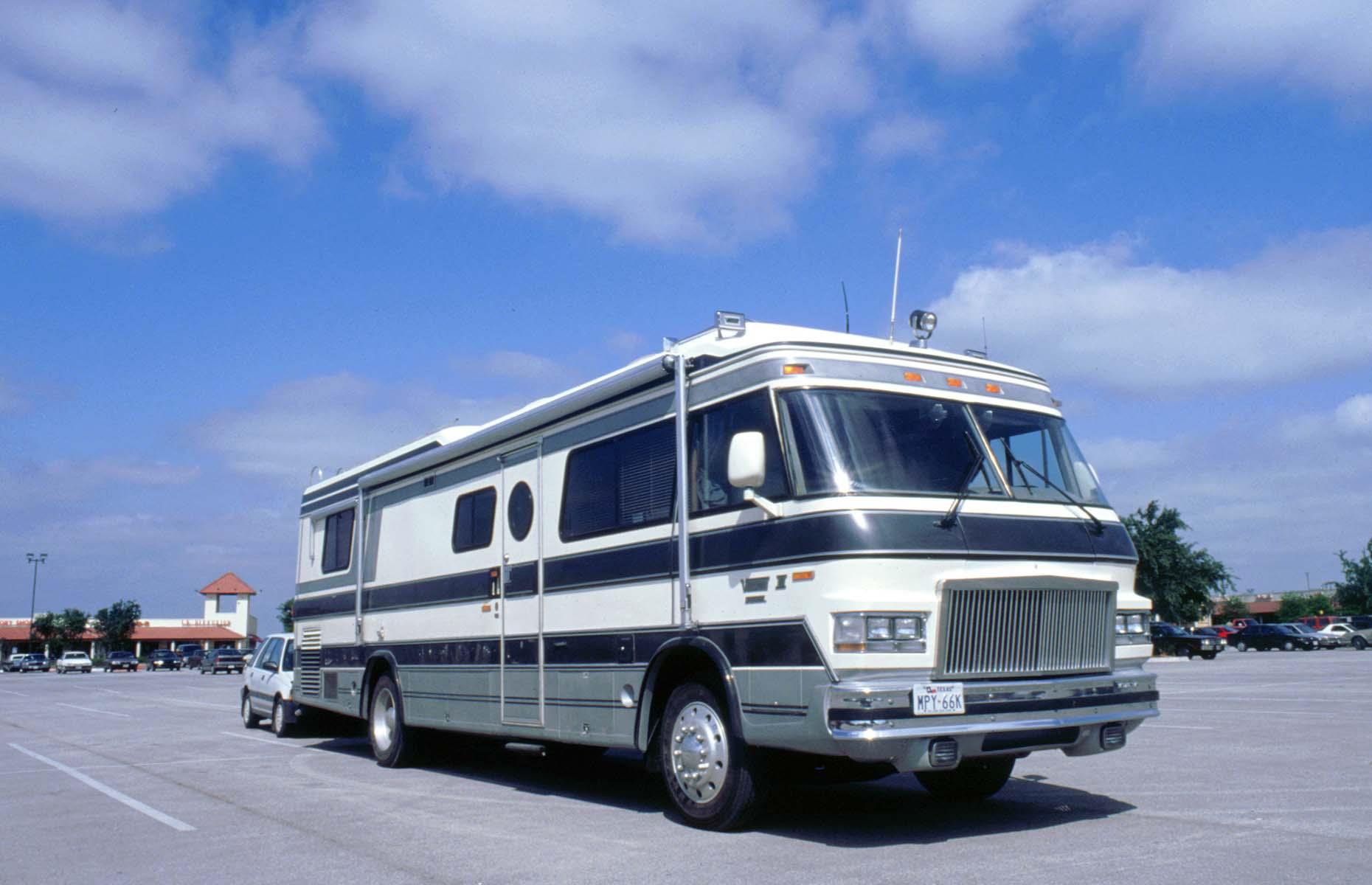 <p>Despite the increased availability and affordability of flying across the States, many families still defaulted to a RV or camping trip through the Noughties. The tragic events of 9/11 in 2001 also led to an increased interest in RV vacations, <a href="https://www.lonelyplanet.com/articles/rv-travel-trend">according to industry experts</a>. This classic American RV is parked up in a lot in Florida in the year 2000.</p>  <p><strong><a href="https://www.loveexploring.com/galleries/94956/what-family-holidays-looked-like-the-decade-you-were-born">Here's what family vacations looked like the decade you were born</a></strong></p>