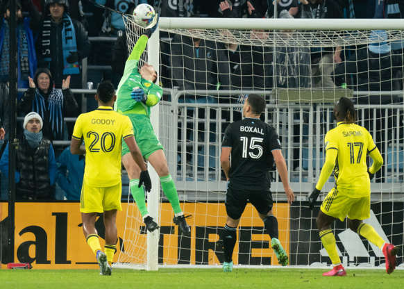 Slide 3 of 9: March 5: Nashville SC goalkeeper Joe Willis makes a leaping save as teammates Anibal Godoy (20) and forward C.J. Sapong (17), and Minnesota United's Michael Boxall (15) look on in the first half at Allianz Field. The game ended in a 1-1 tie.