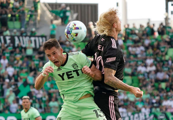Slide 1 of 9: March 6: Austin FC's Ethan Finlay (left) battles for the ball against Inter Miami's Brek Shea in the second half at Q2 Stadium. Austin FC won the game, 5-1, setting a league record for the most goals (10) by a team through the first two weeks of a season.