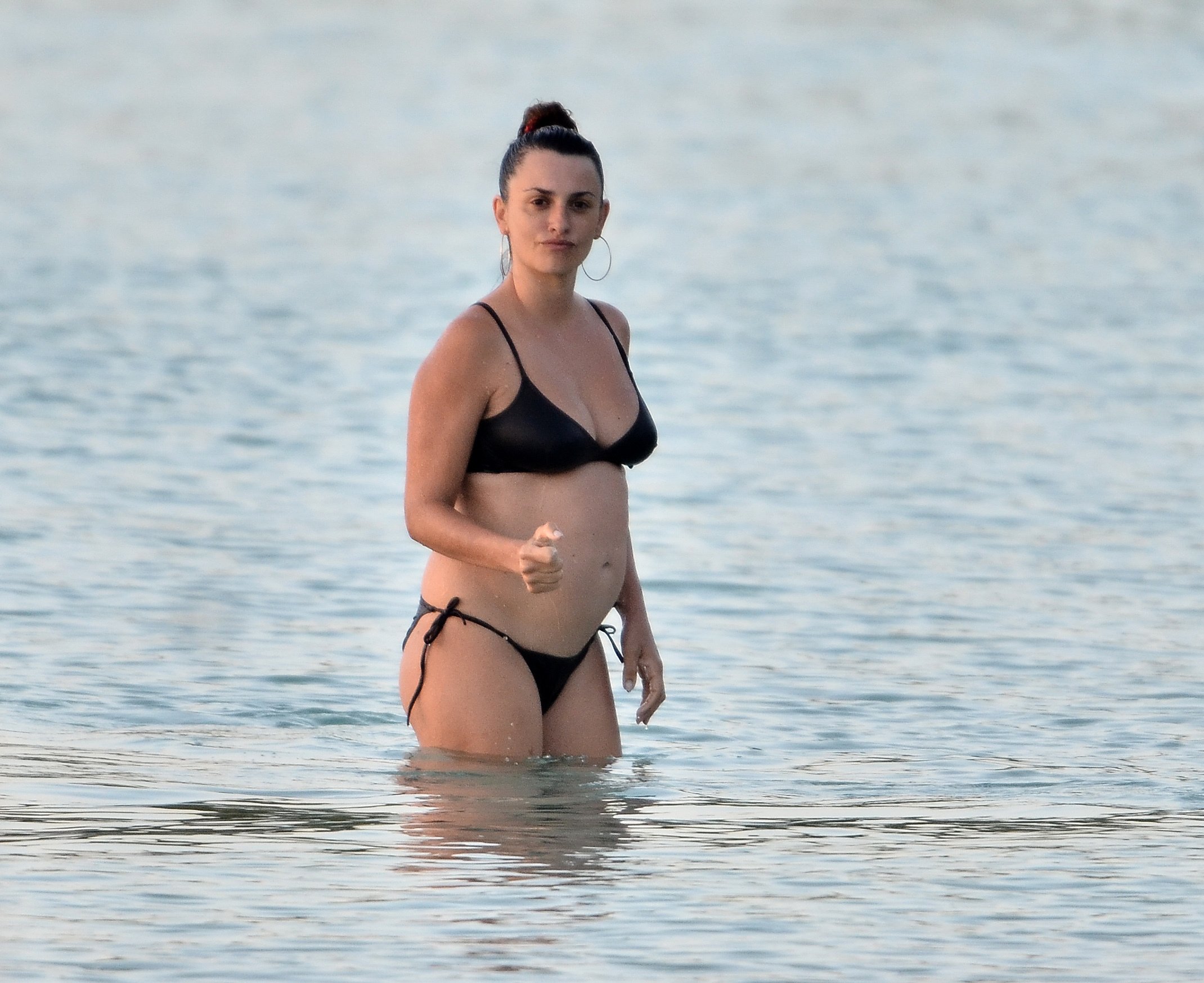 Adam Levine S Wife Debuts Her Third Baby Bump In A Tiny Blue Bikini