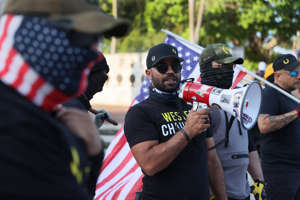 Enrique Tarrio, leader of the Proud Boys, addresses a crowd in Miami on May 25, 2021, at the Torch of Friendship to remember the one-year anniversary of the killing of George Floyd.